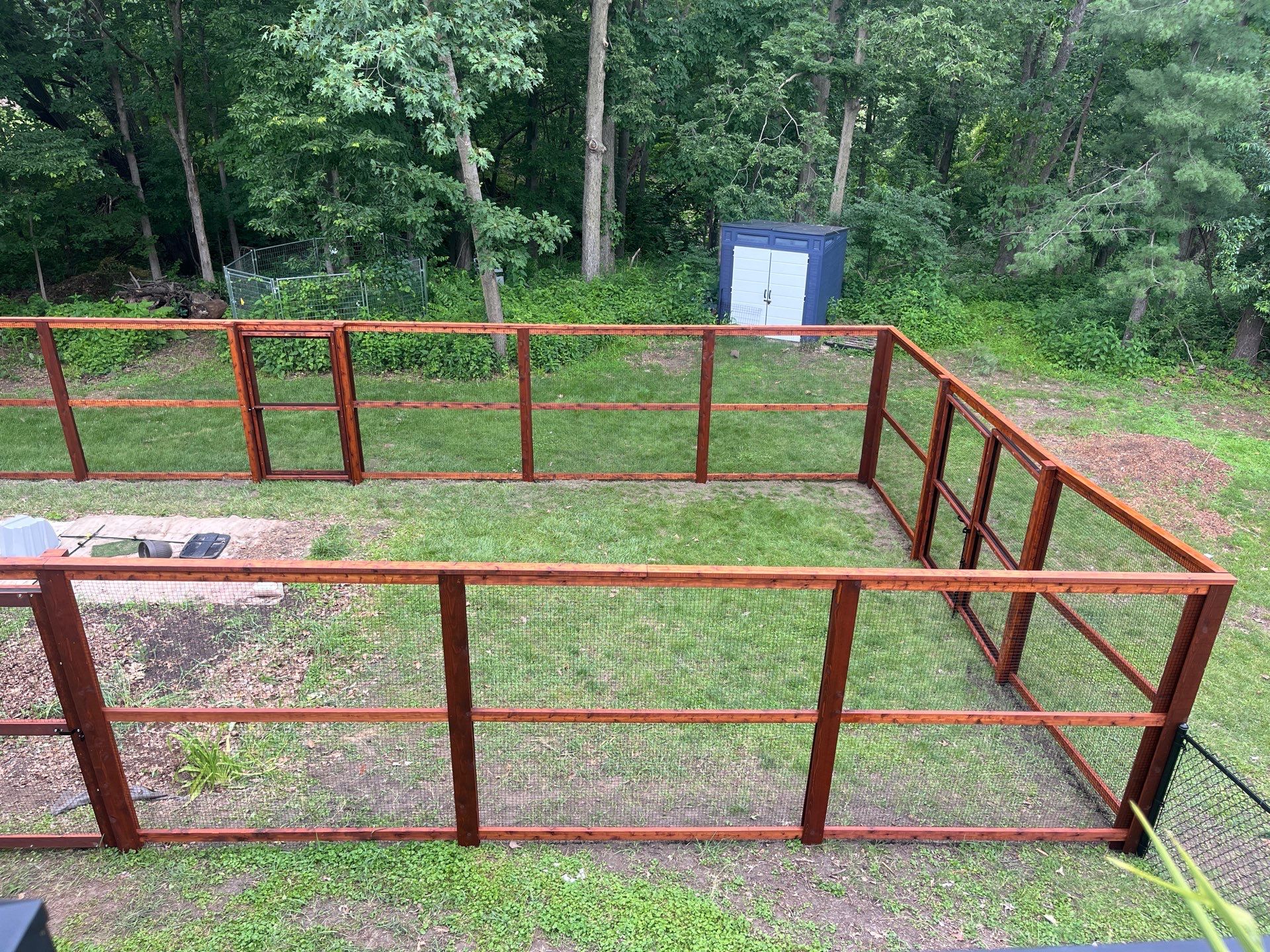 Stained Cedar Mahogany Garden Fence and Raised Bed Enclosure in Cedar Falls by Perfect Picket Fence and Stain