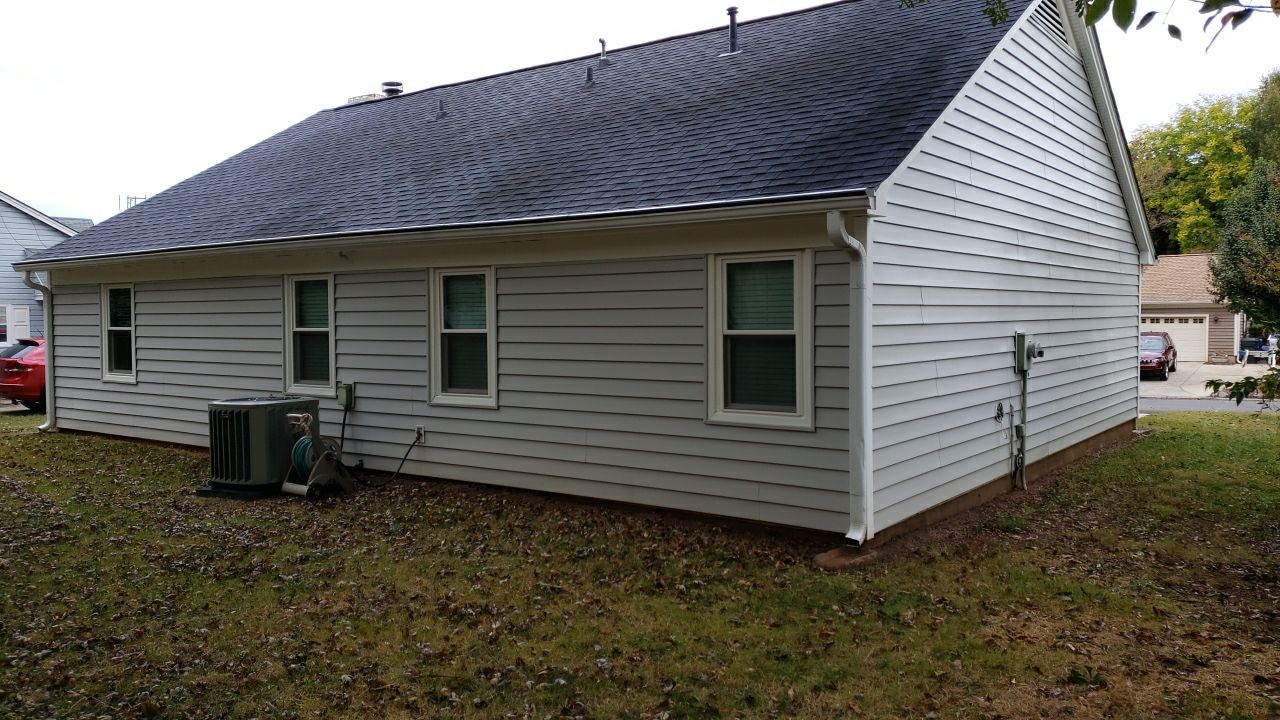 House Wash using cleaner  by Power Wash Masters LLC