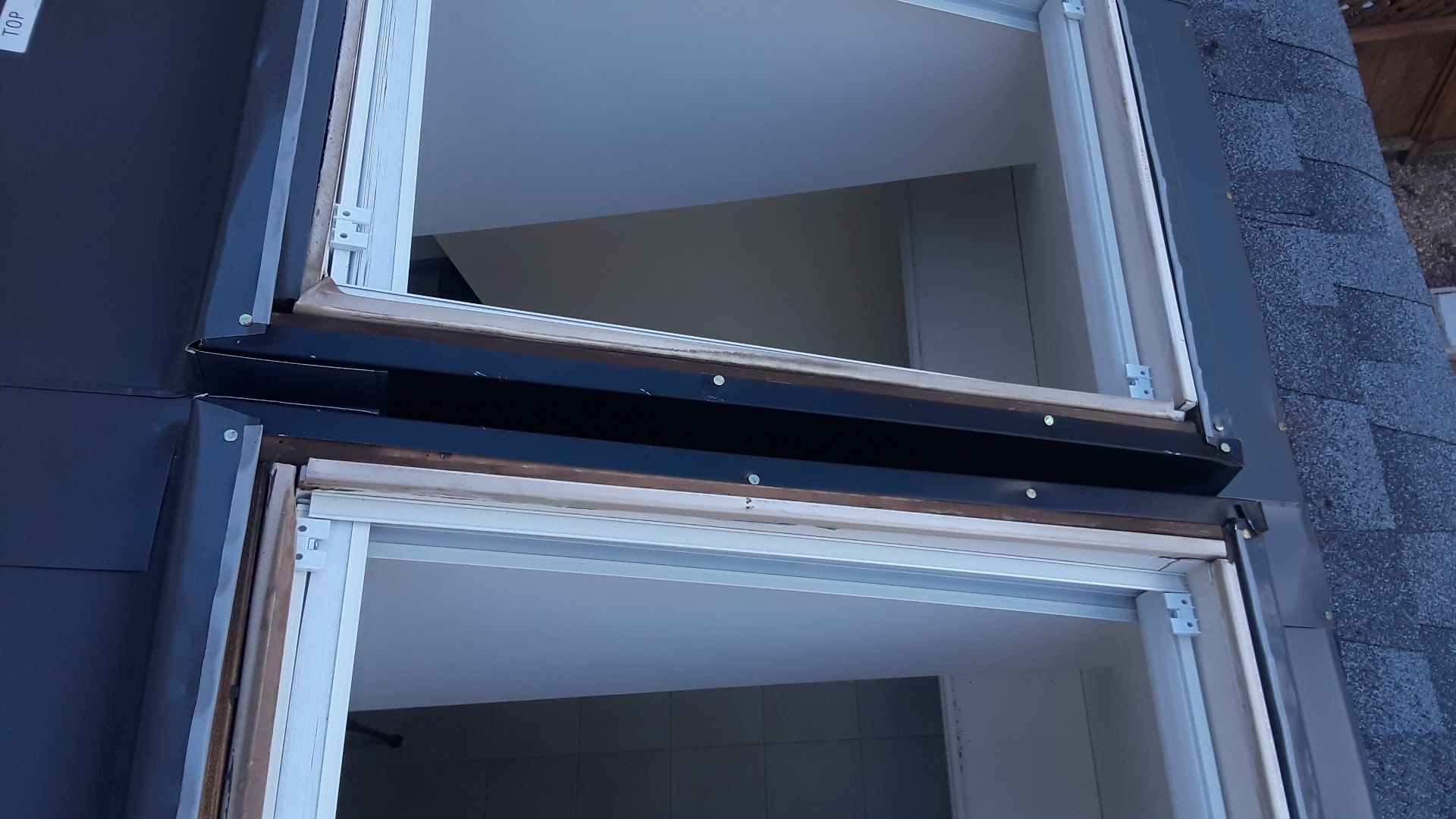 Roof, Window, and Skylight Replacement by American Home Contractors