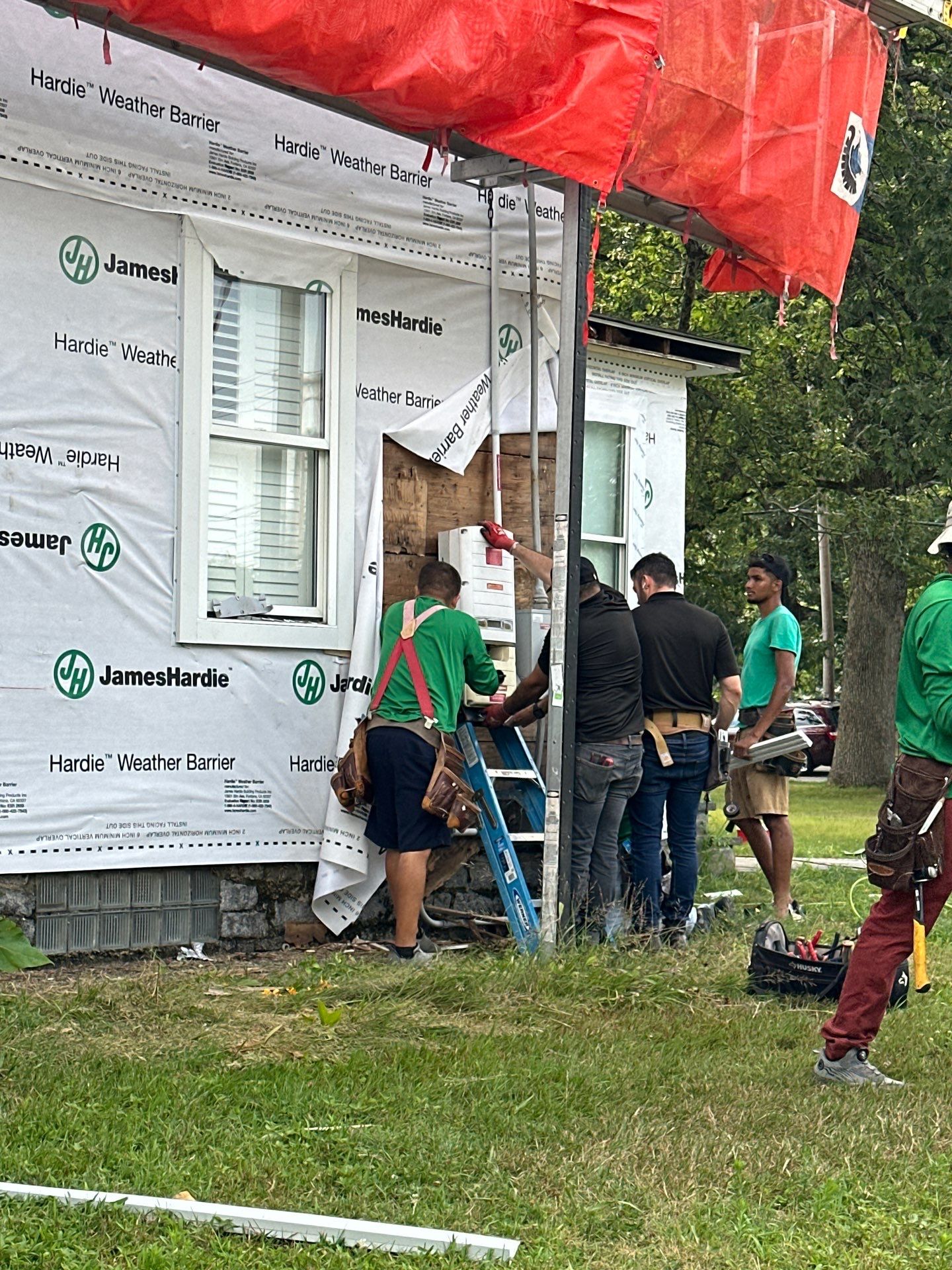 James Hardie Lap Siding Installation in Chelmsford, MA by Mighty Dog Roofing of Greater Middlesex County