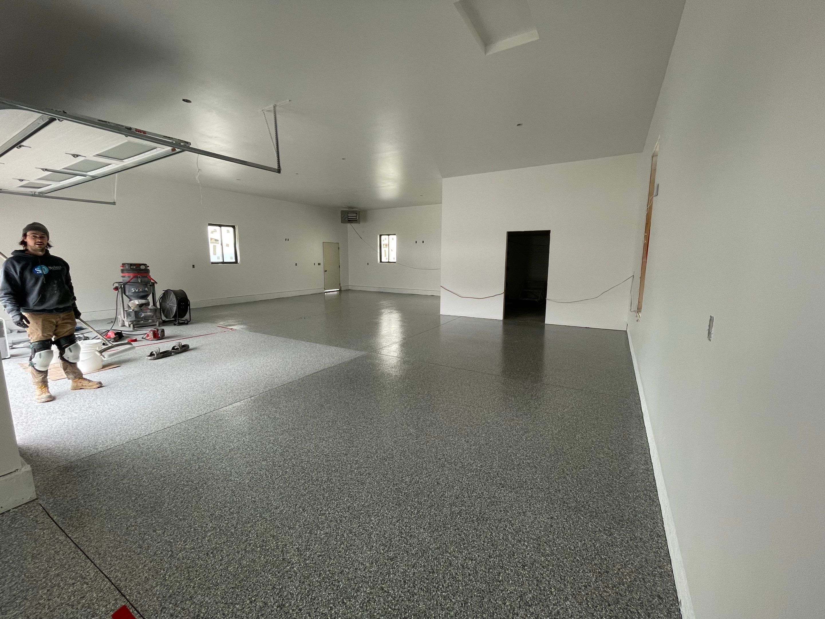 Garage using Slate Stone by Select Painting, Coatings & Garage Cabinets