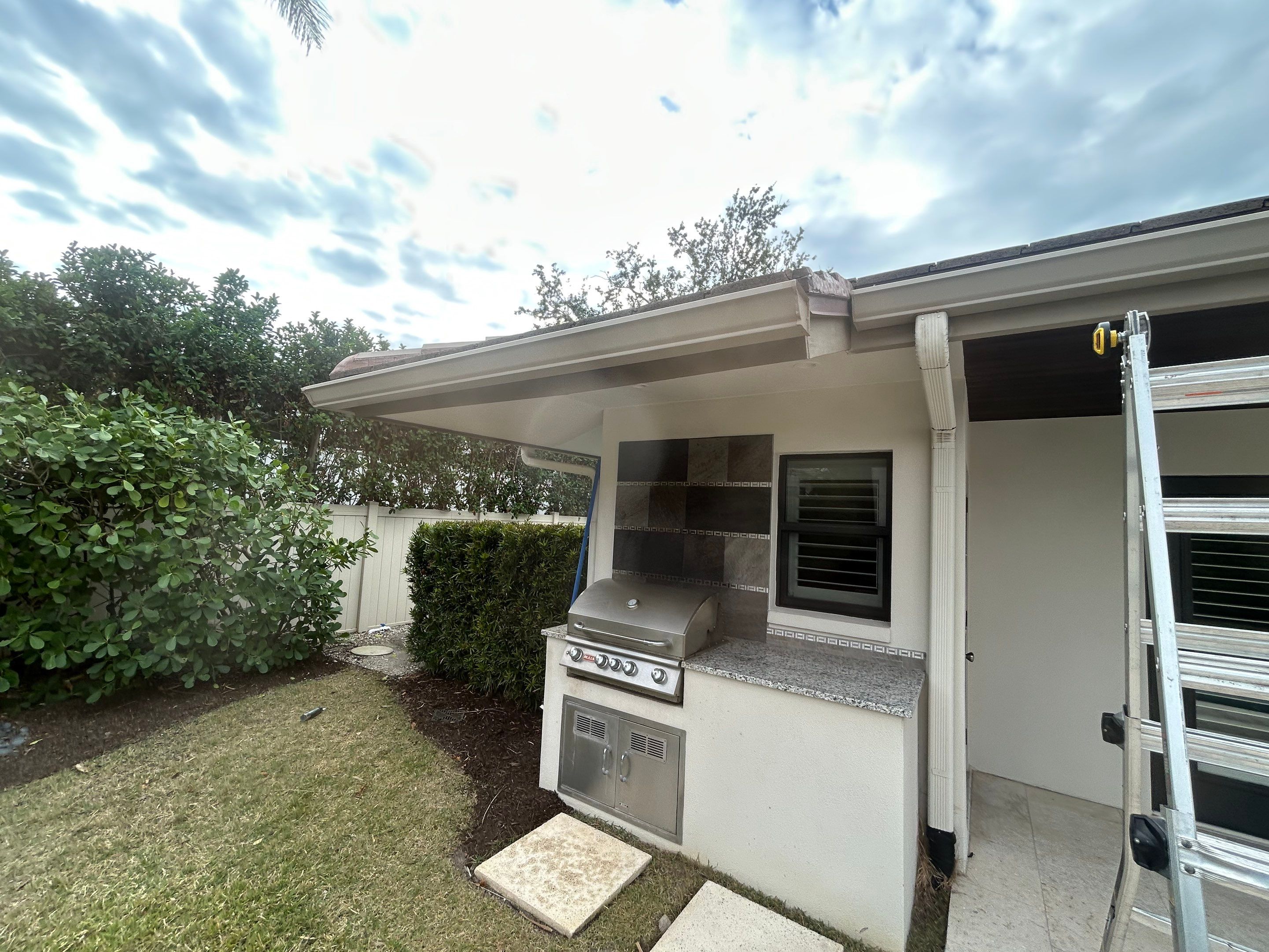 6-Inch White Seamless Gutters in Sarasota FL by Gutter Professors