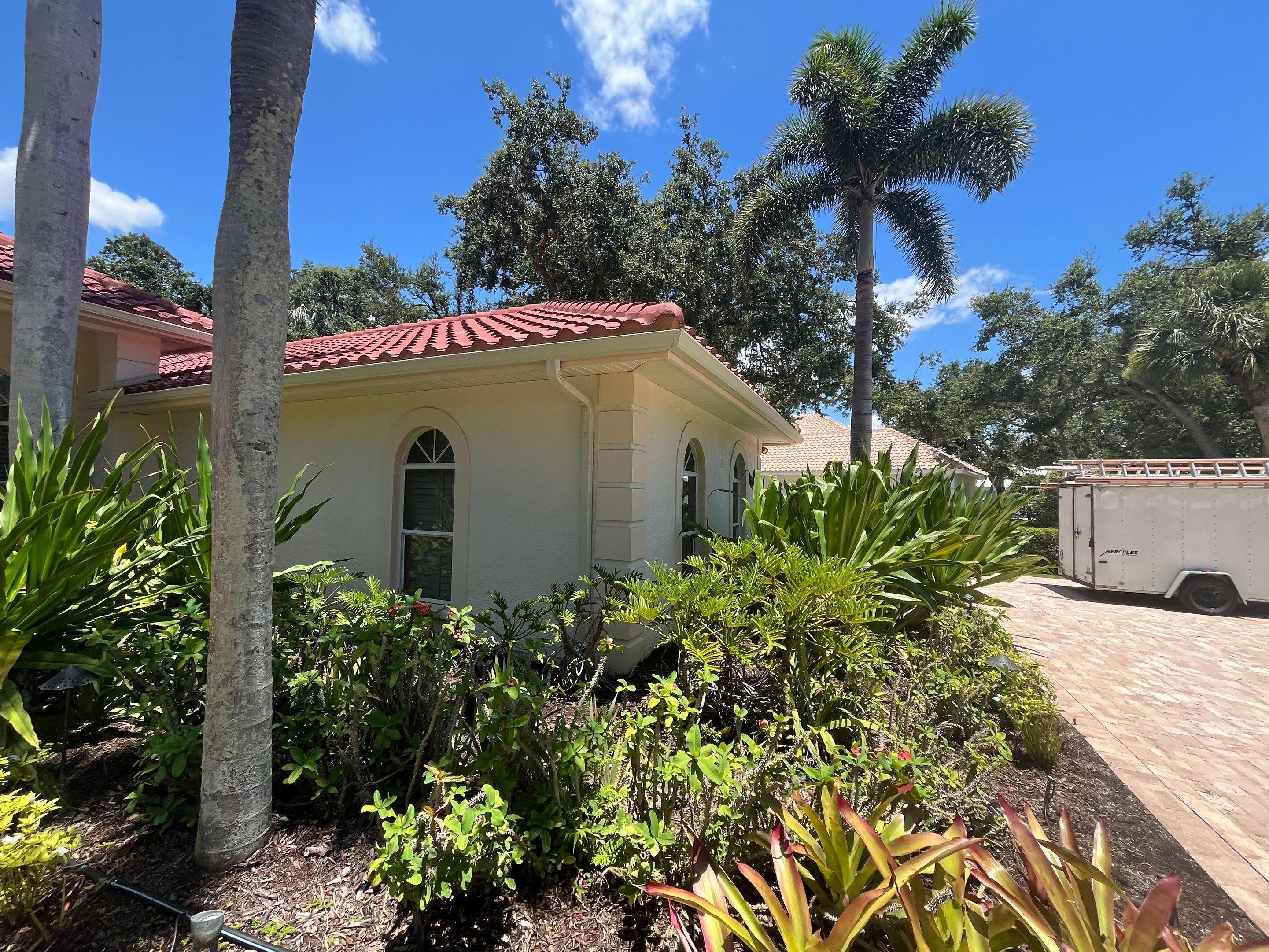 Splash Guard Gutters for Rainy Season Protection in Osprey FL by Gutter Professors