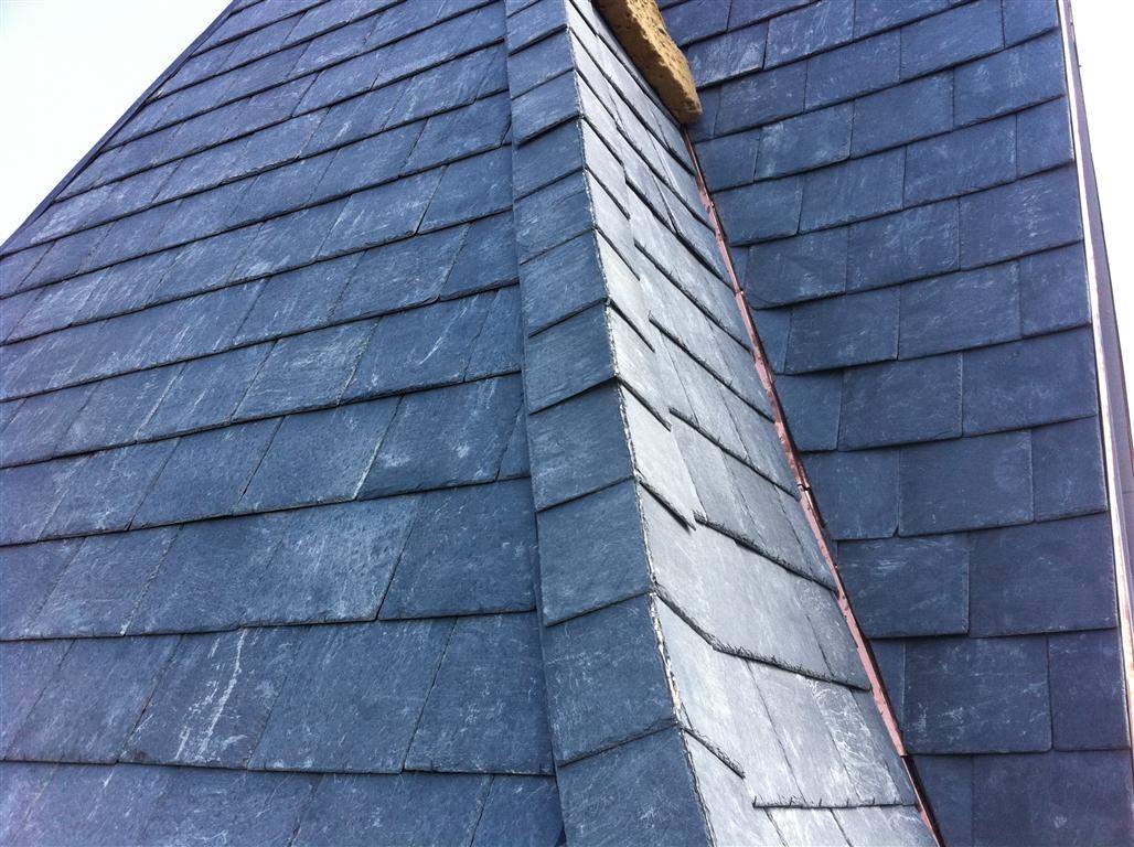 Historic Building ROOF REPLACEMNT with GAF TruSlate  on steep slop and Versico 60mil TPO on flat roof by Gorilla Exteriors Contracting, LLC