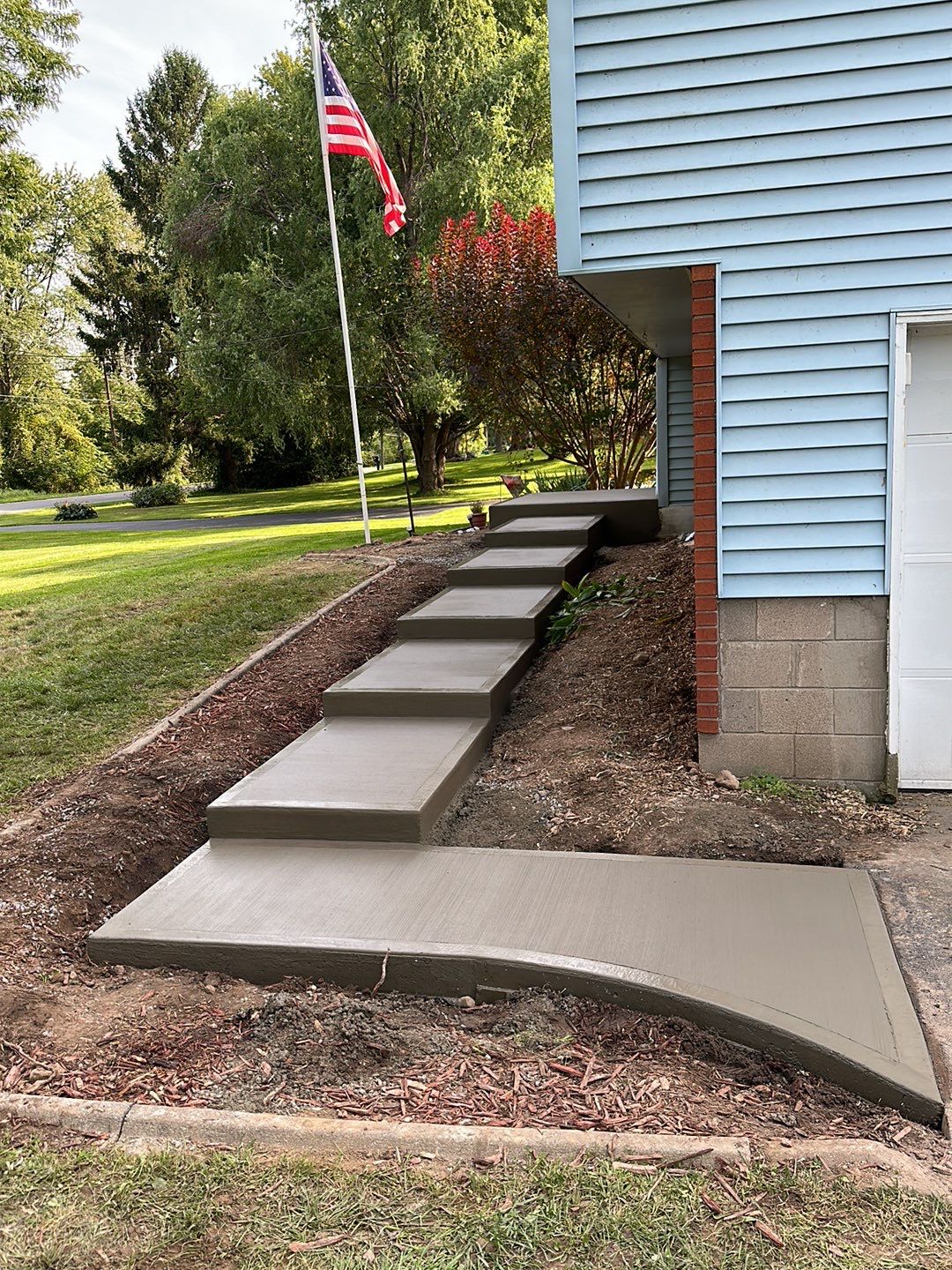 Steps with Broom Finish  by NG Masonry & Construction LLC
