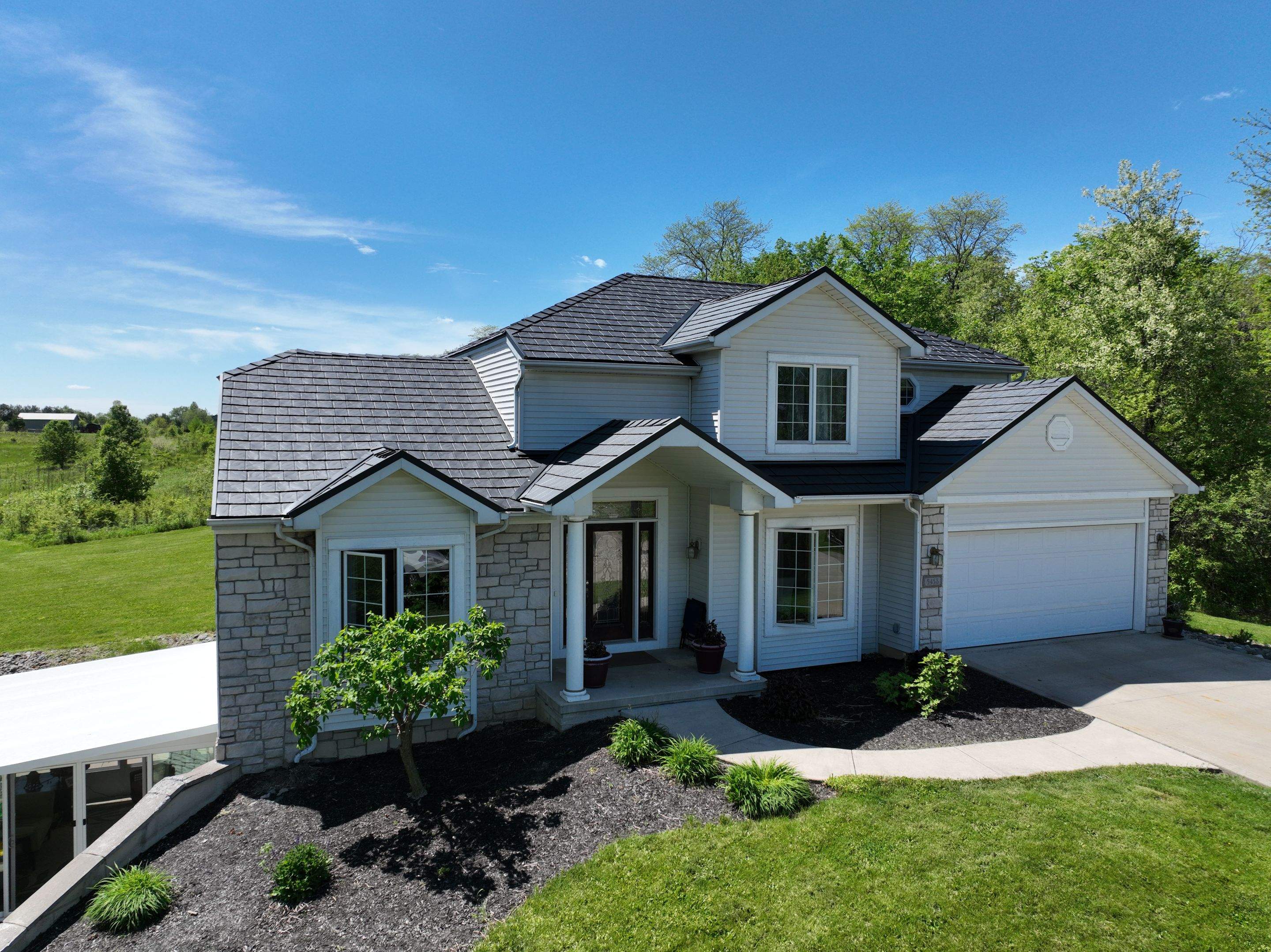 Residential Roofing Installation using Vic West Nothridge Slate by 4Ever Metal Roofing