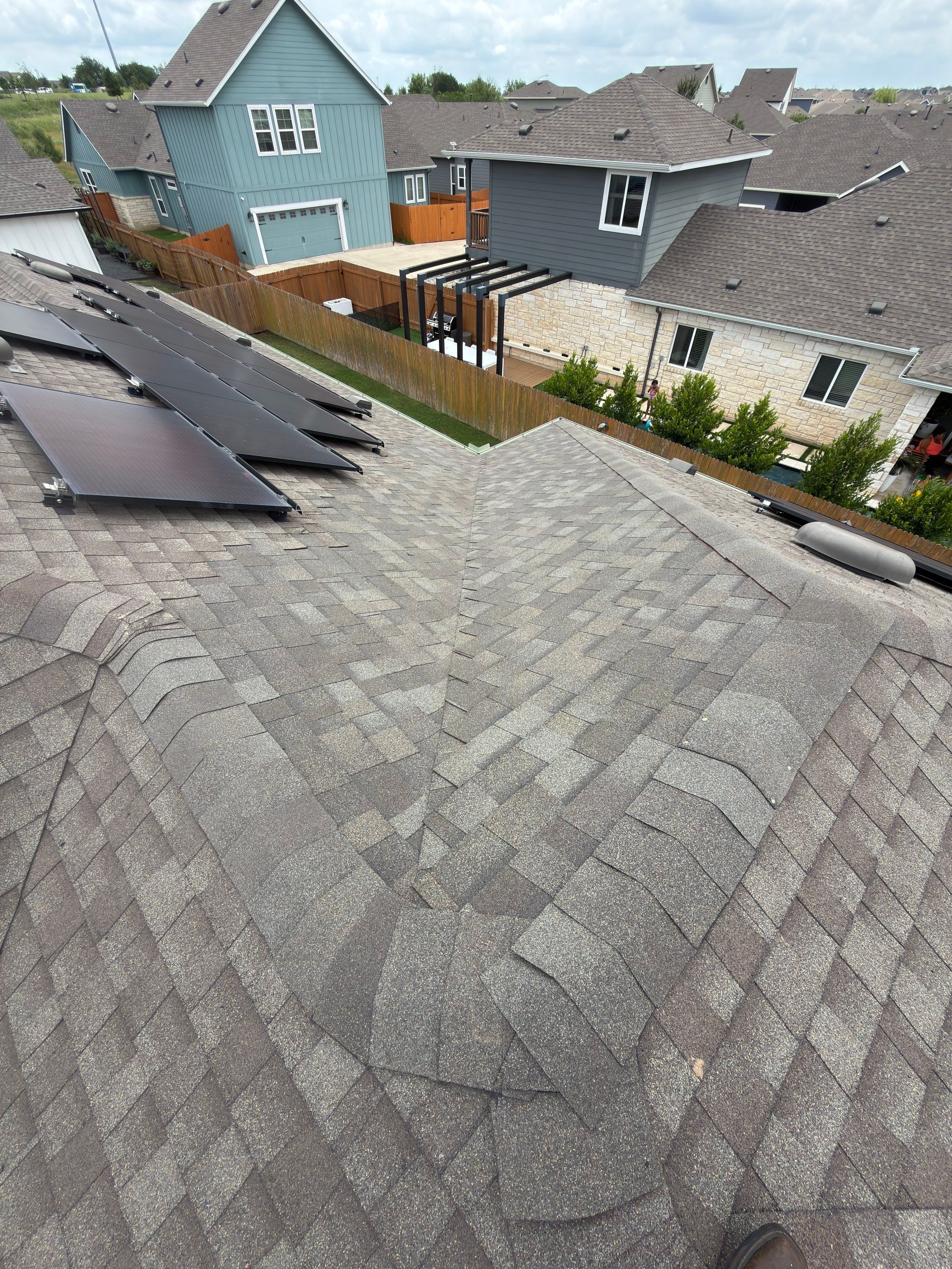 Roof Replacement with Solar Re-Install in Southeast Austin by Skywall Construction LLC