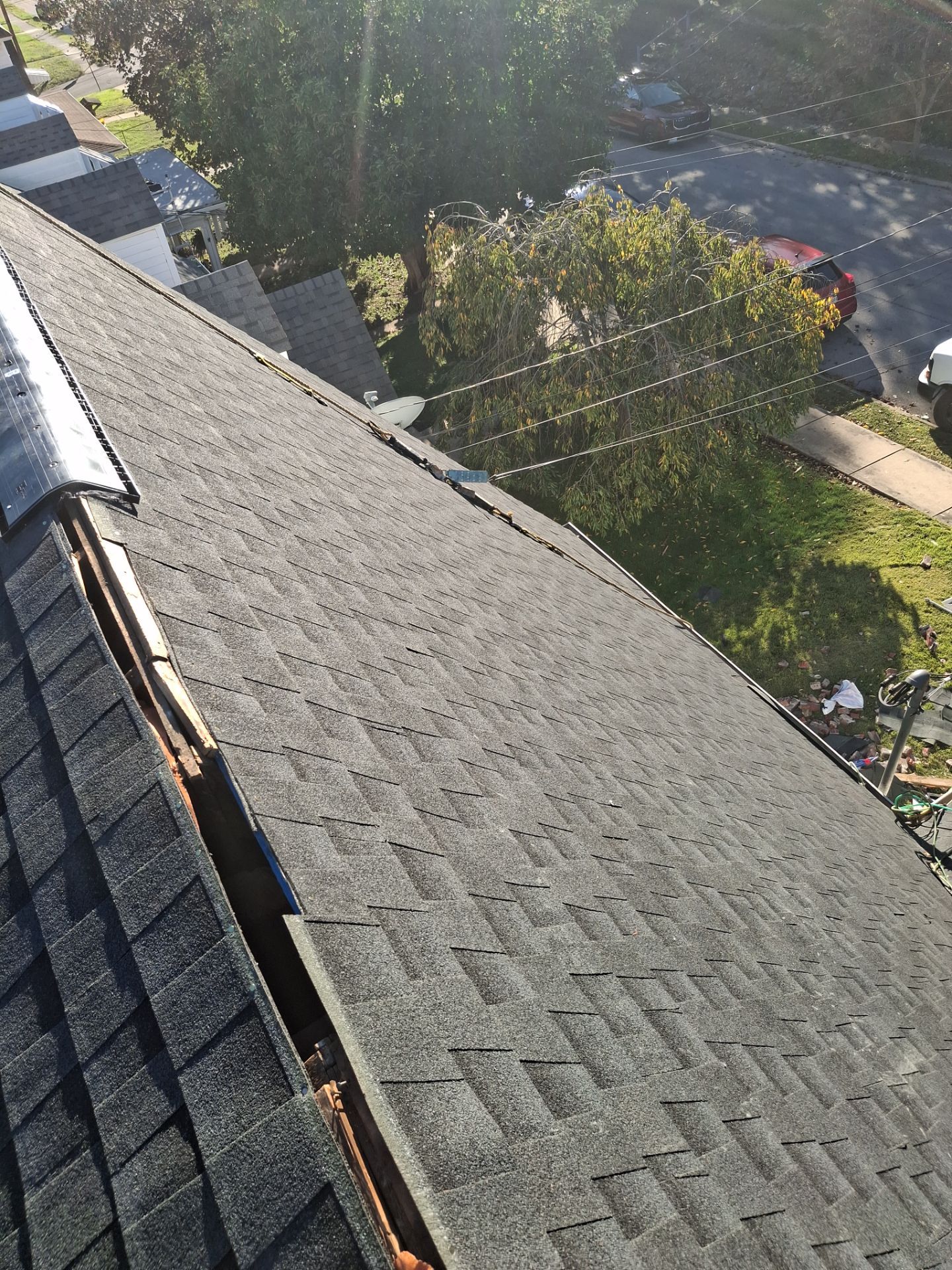 Residential Roofing Installation using GAF Timberline HDZ Charcoal by Rainstoppers Roofing