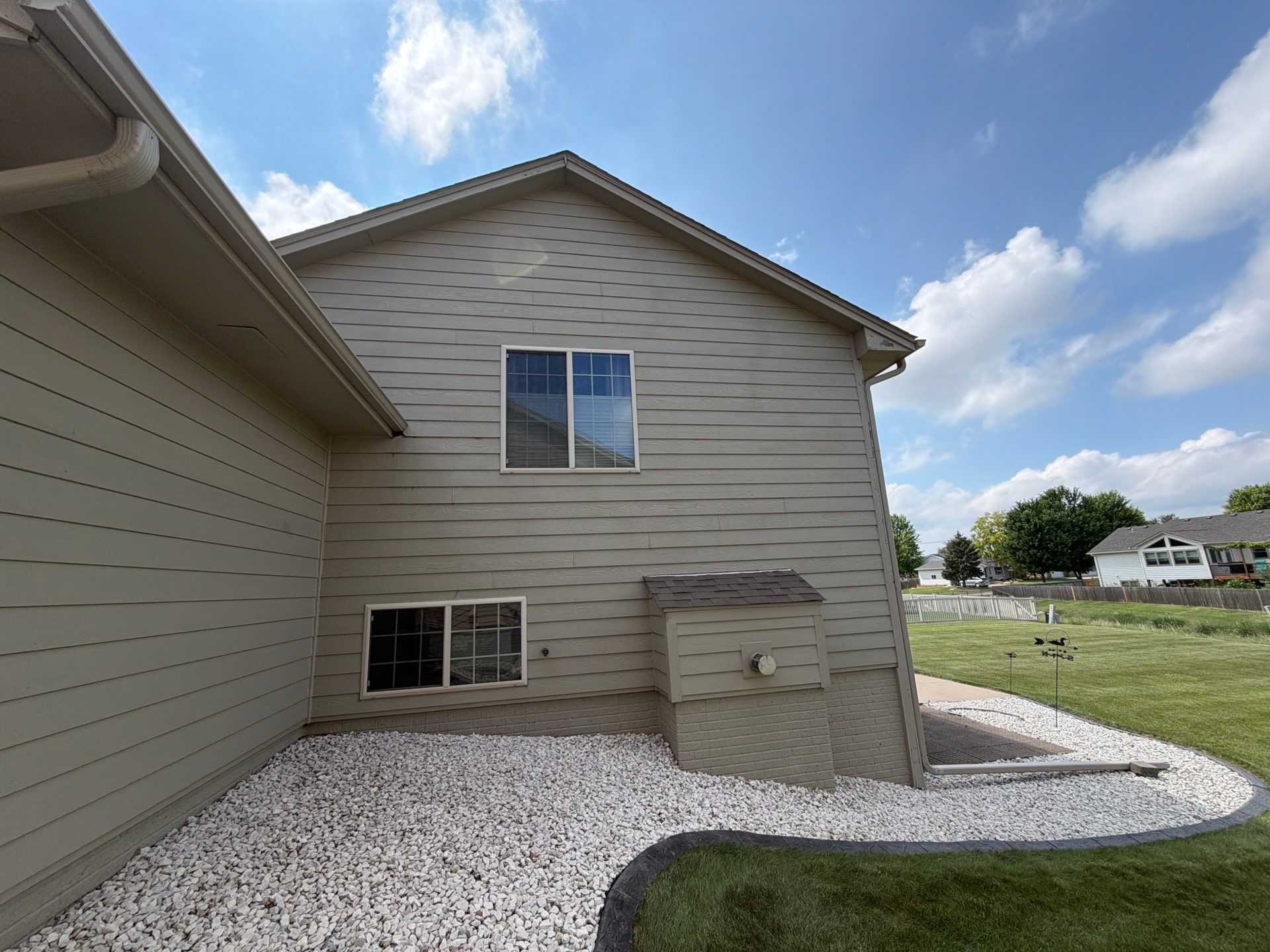 Residential Exterior Painting and Siding Refresh in Sioux Falls by Select Painting, Coatings & Garage Cabinets