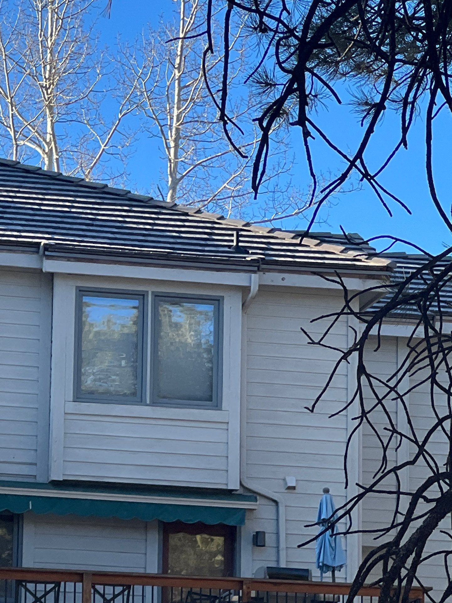 Residential Roofing Installation using Concrete Tile by Blue Peaks Roofing LLC 