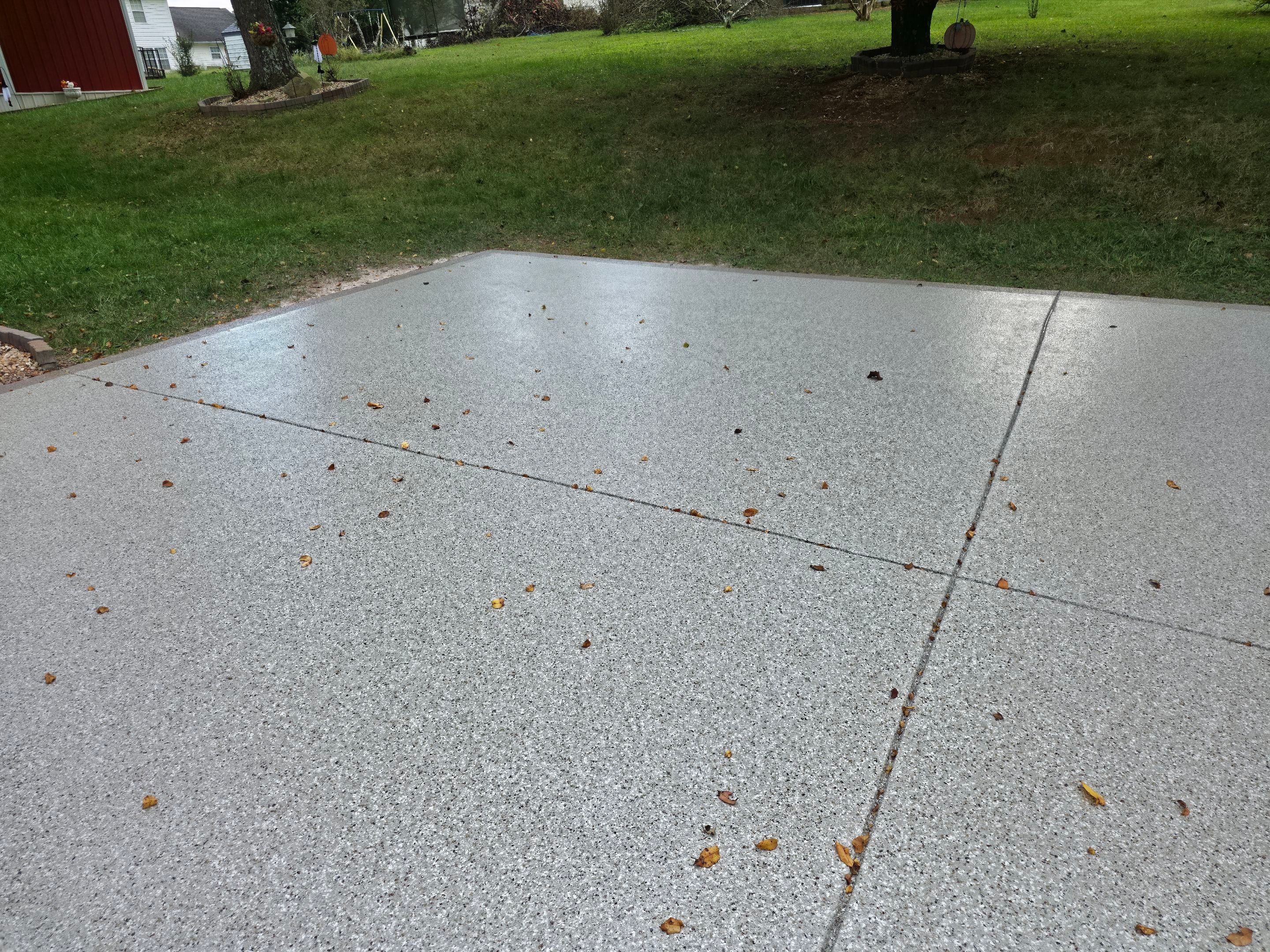 Driveway Using Creekbed and Garnet by Elite Floor Solutions
