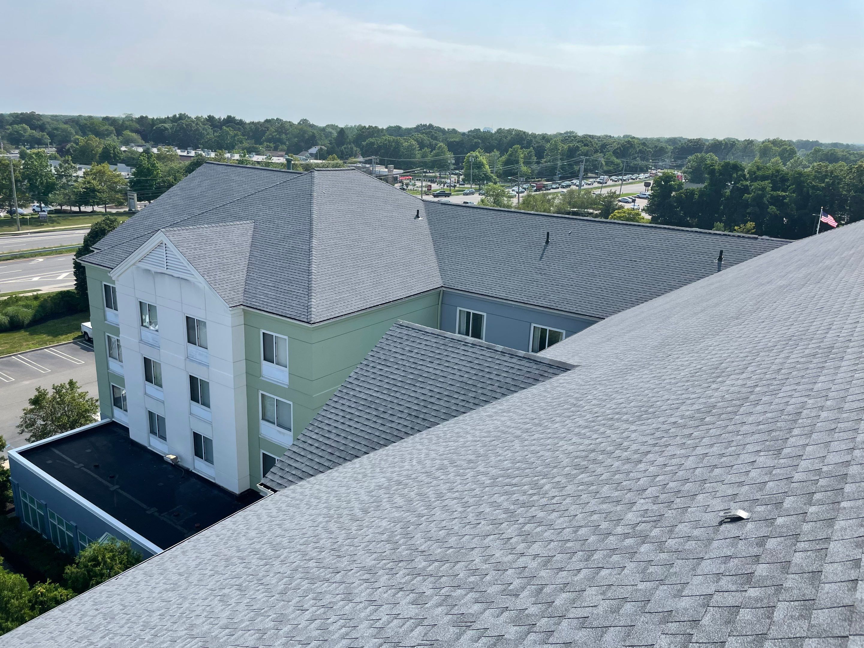 Commercial Roofing Installation using GAF Timberline / New Gutters and Downspouts by All Site Roofing