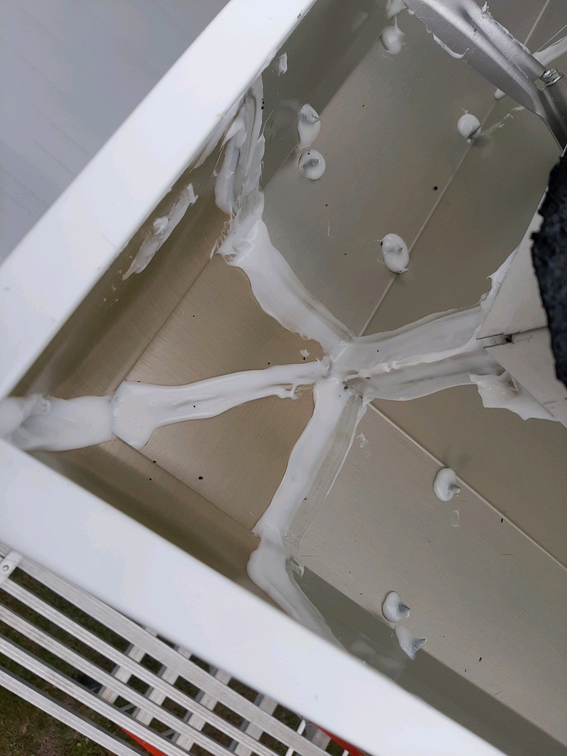 Gutter Installation using White K-Style Seamless Gutters by Gutter Professors