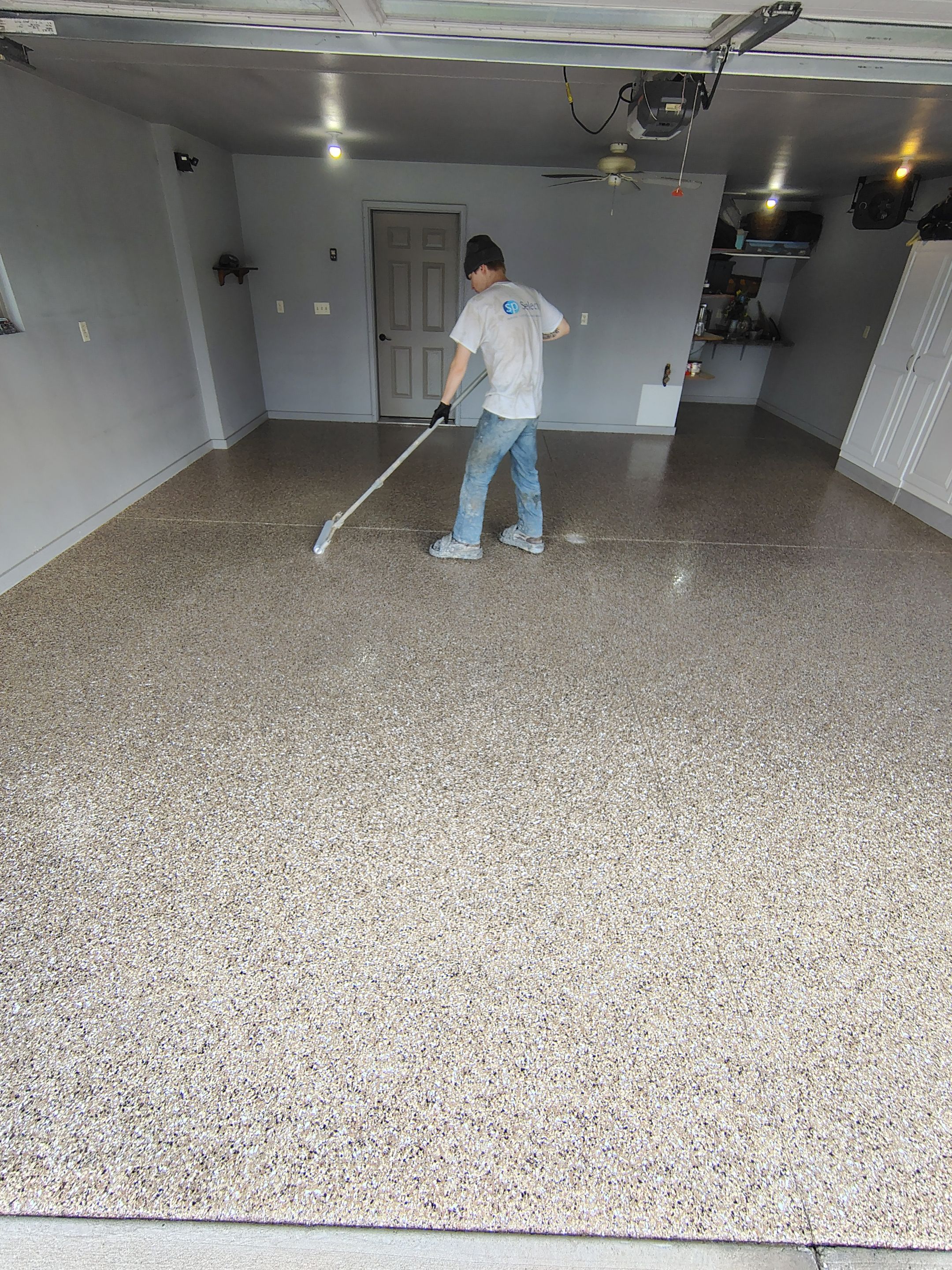 Multi-Colored Speckled Epoxy Concrete Coating for Residential Garage by Select Painting, Coatings & Garage Cabinets