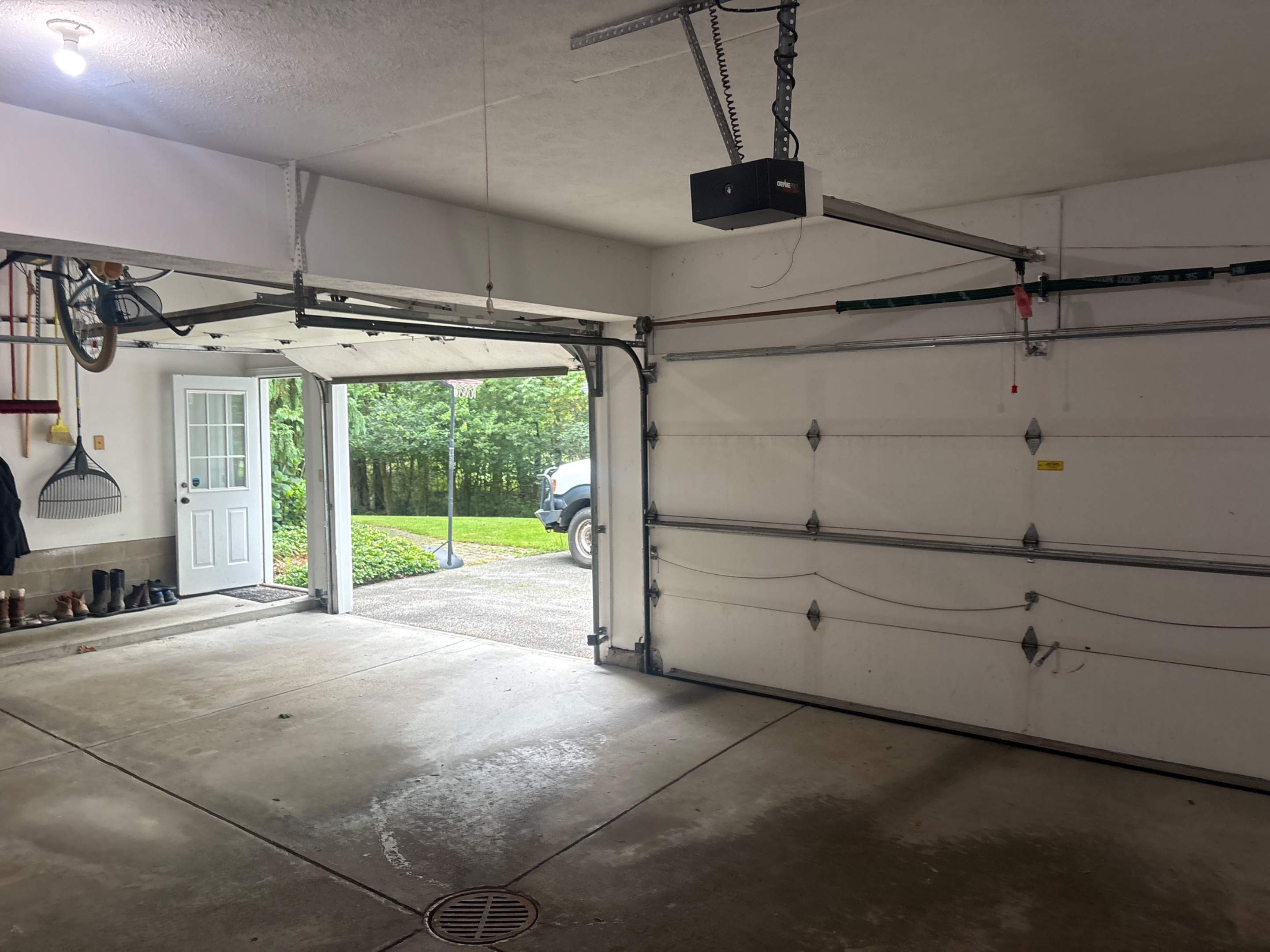 White Raised Panel Sectional Garage Door Installation in Solon by Ohio Garage Door Repair