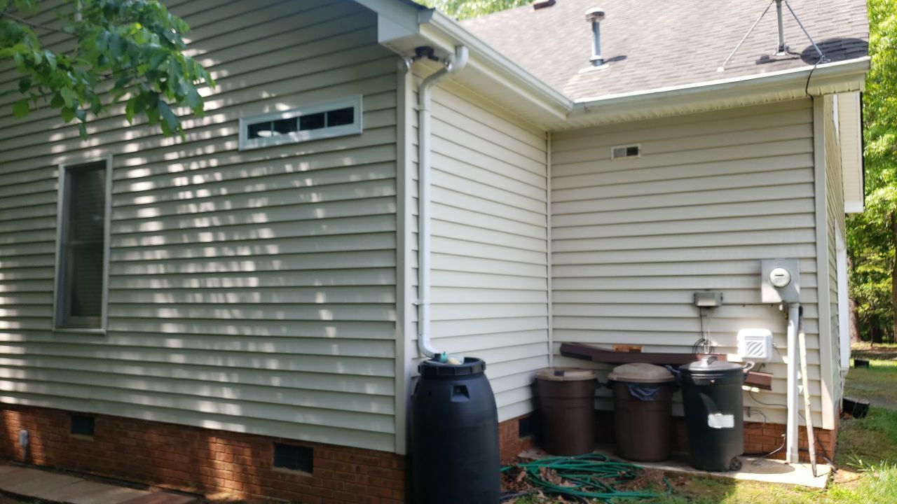 House Wash using cleaner by Power Wash Masters LLC