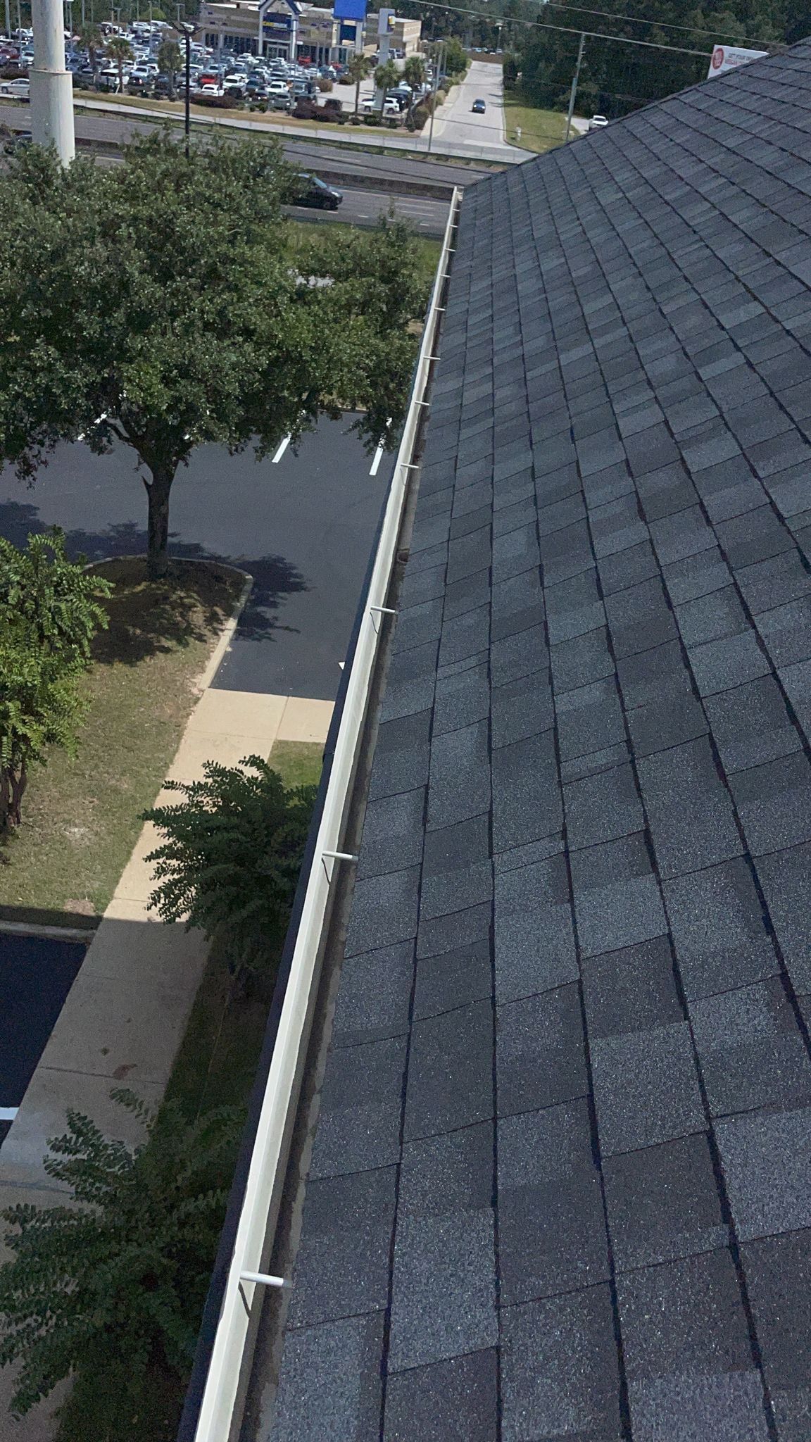 Commercial Roofing Installation using Roof Replacement by American Roofing & Construction LLC