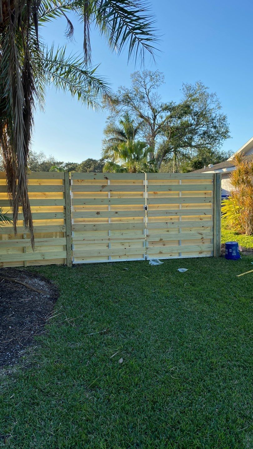 Wood Fence Installation using Shadowbox Wood Fence by Asap fence and gates, LLC