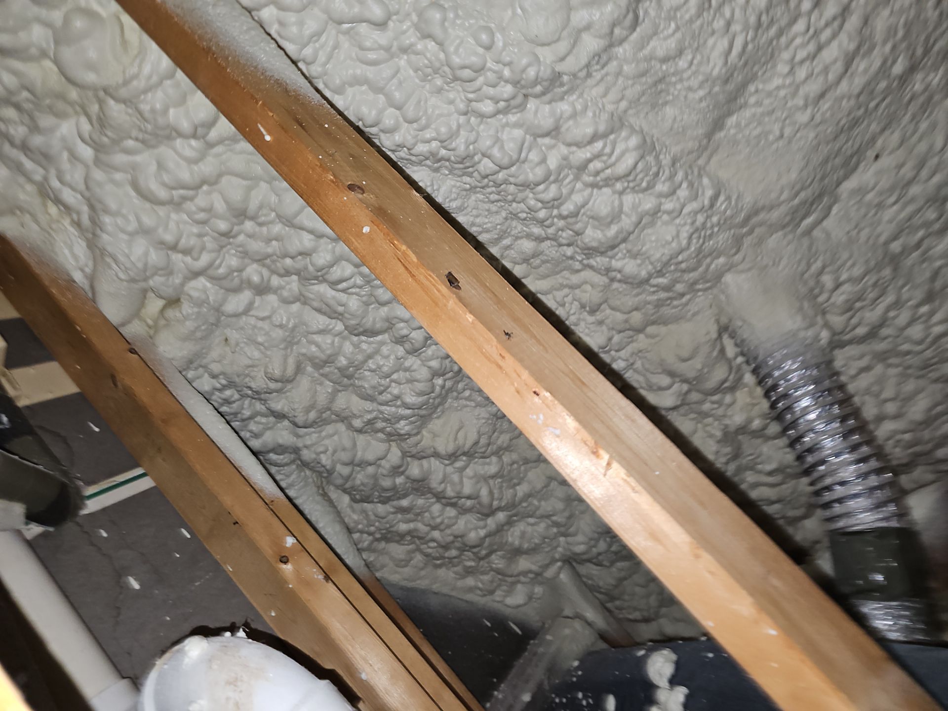 Attic Insulation using open cell spray foam by NYS Foam & Energy