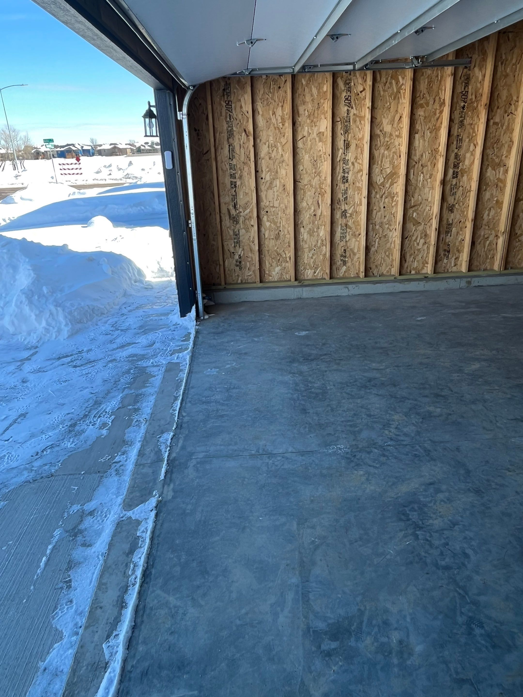 Garage using Slate Stone by Select Painting, Coatings & Garage Cabinets