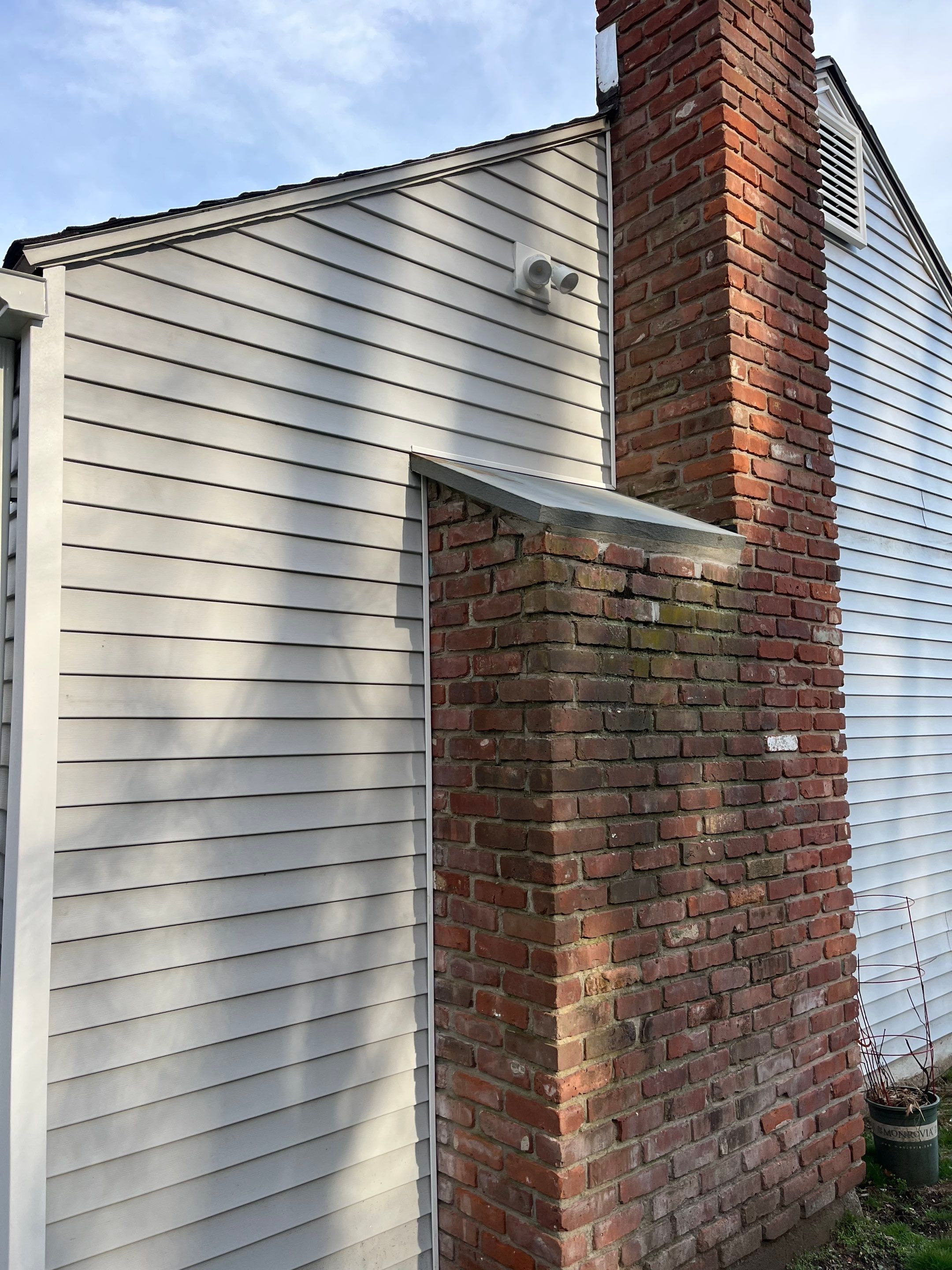 New Siding & Partial Chimney Rebuild by Regal Renovations