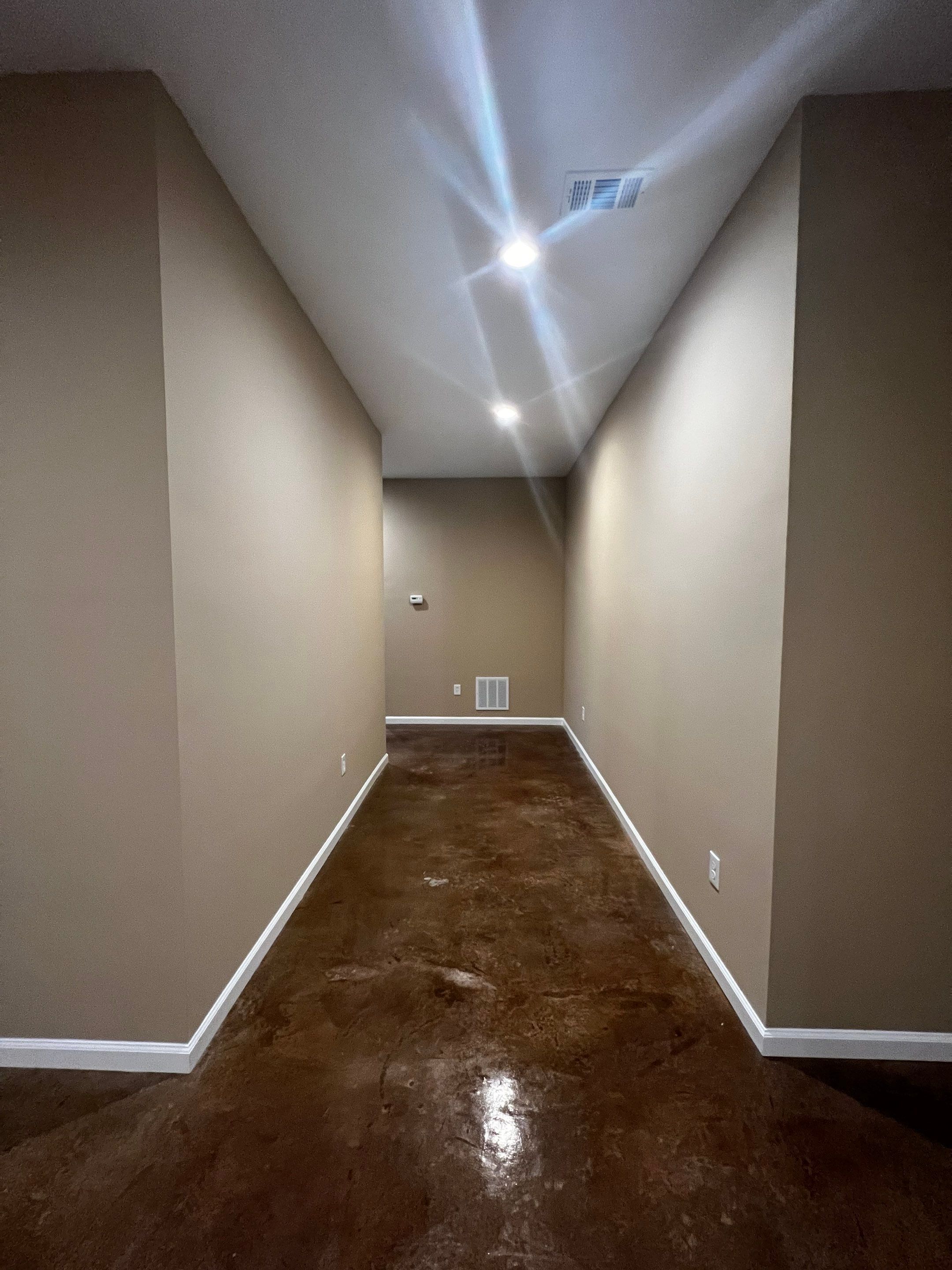 Finished Basement Renovation Featuring Polished Concrete in Atlanta by Swift Home Renovations