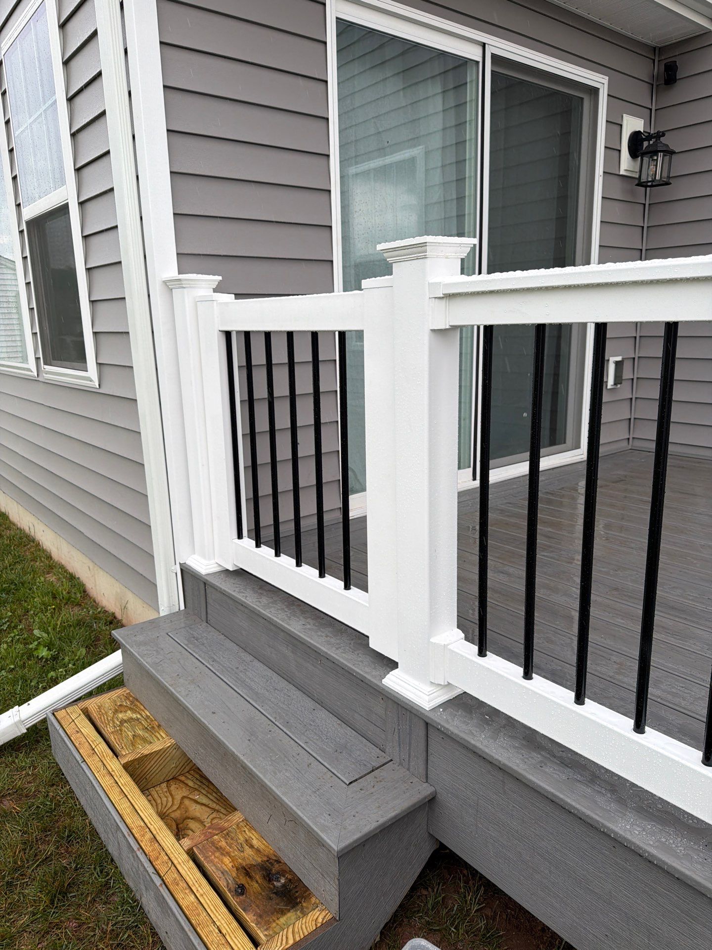 Custom Gray Composite Deck Installation in Duncannon by Esh Builders