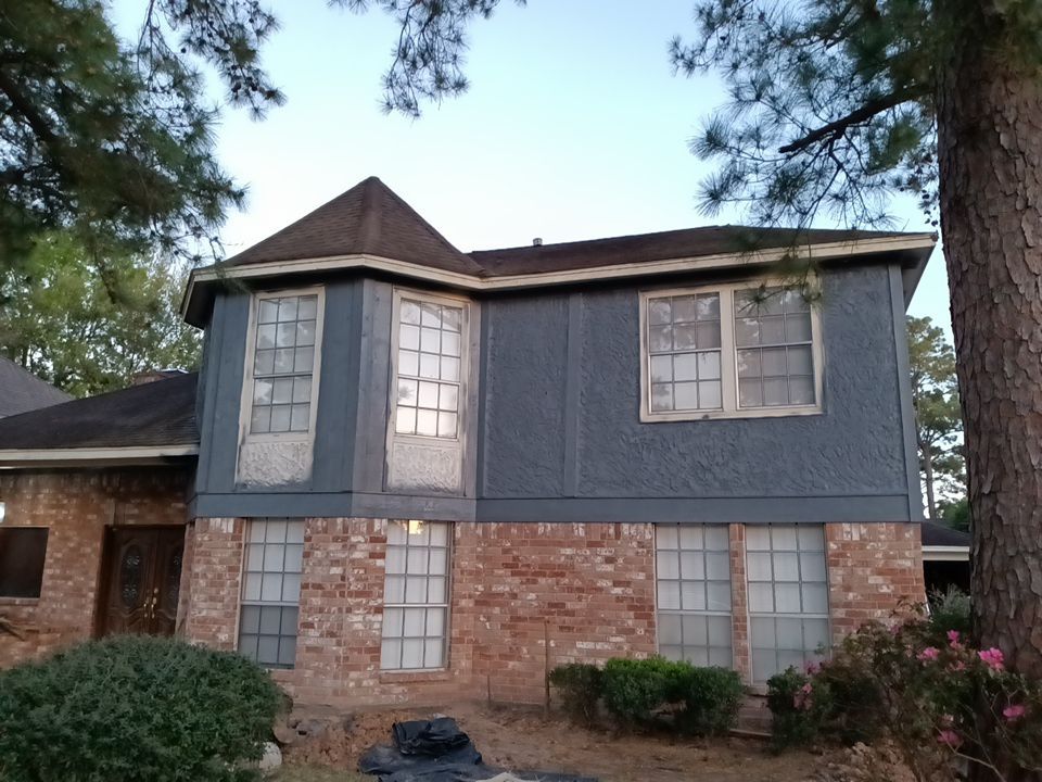 Interior and exterior painting project by Roof Concepts Construction