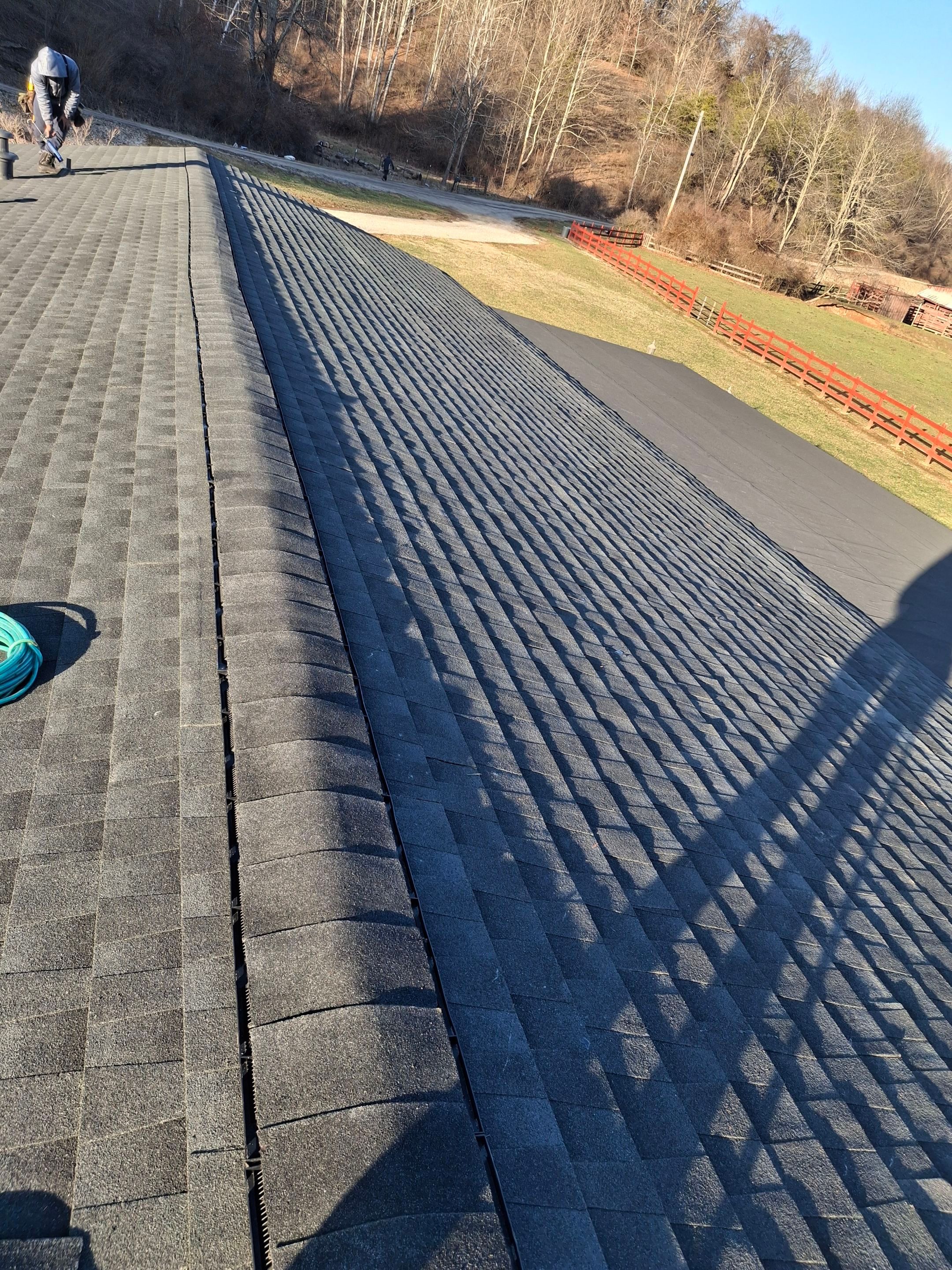 Residential Roofing Installation using GAF Timberline HDZ Charcoal by Rainstoppers Roofing