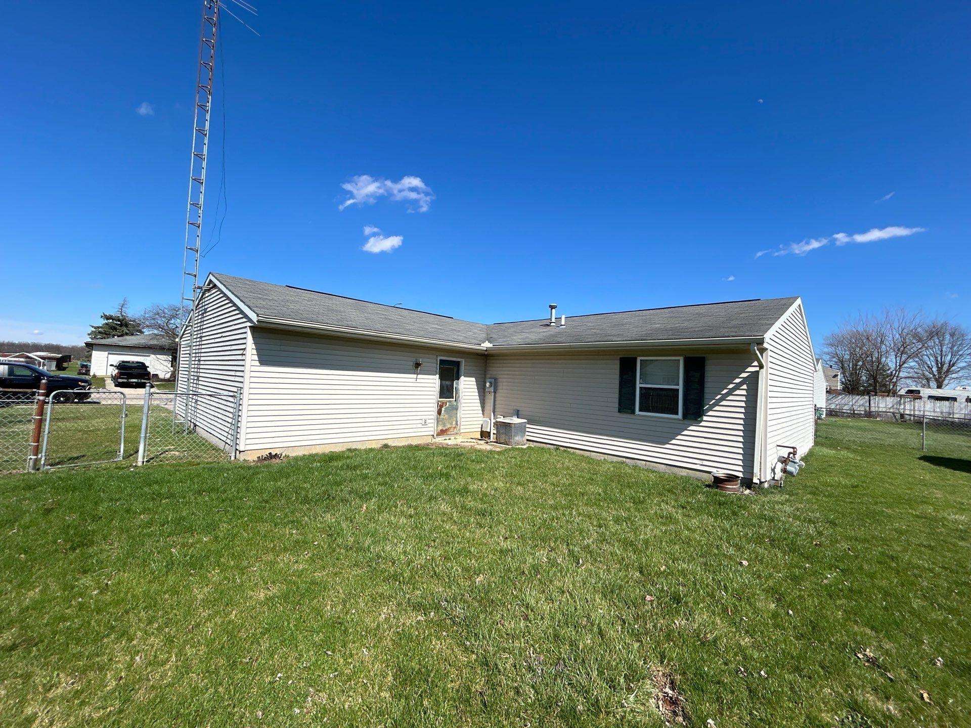 Storm Damage Residential Roof and Siding Installation by WIW Enterprises Inc