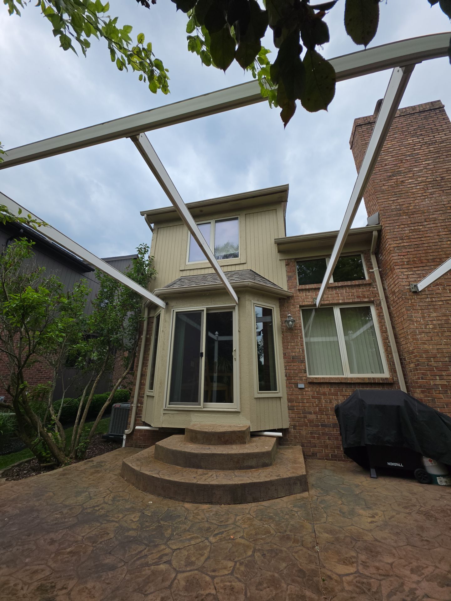 Siding and Wood Trim Repair for Washington Residential Property by Top Shelf Painter