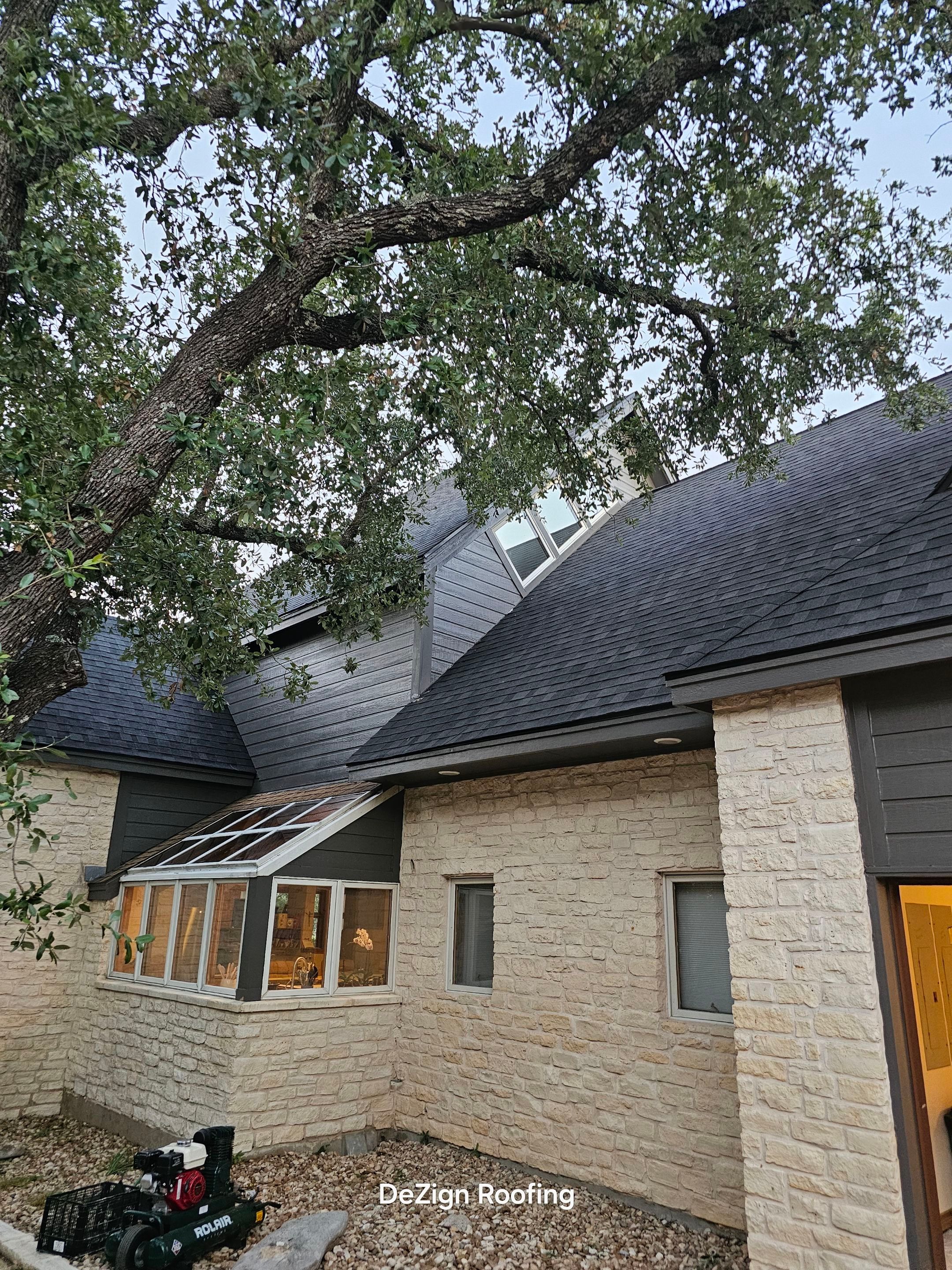 Residential Roofing Installation using IKO Nordic Granite Black by DeZign Roofing & Exteriors