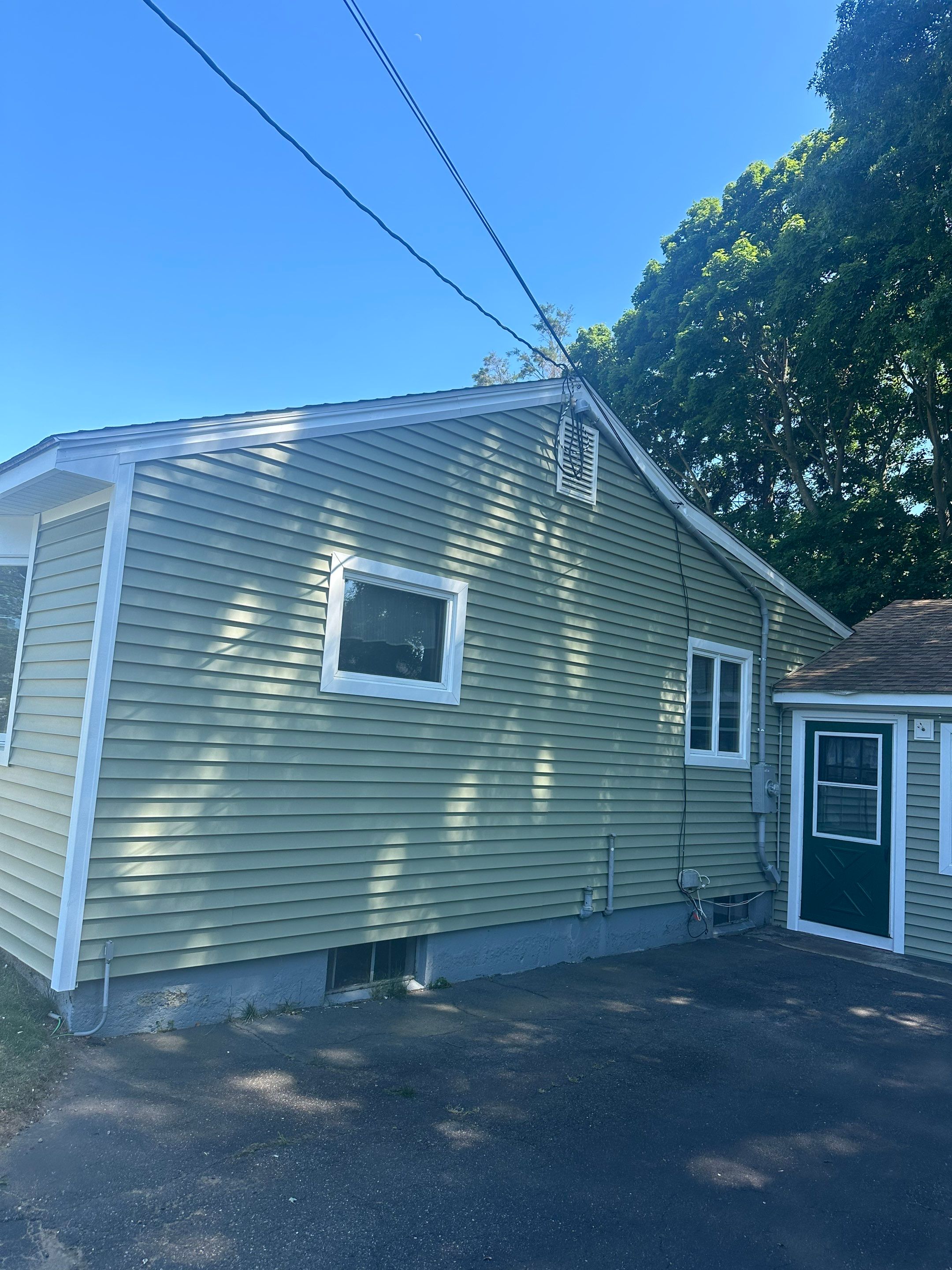 Siding Installation using Clapboard Monogram D4 Cypress by A Plus Exterior