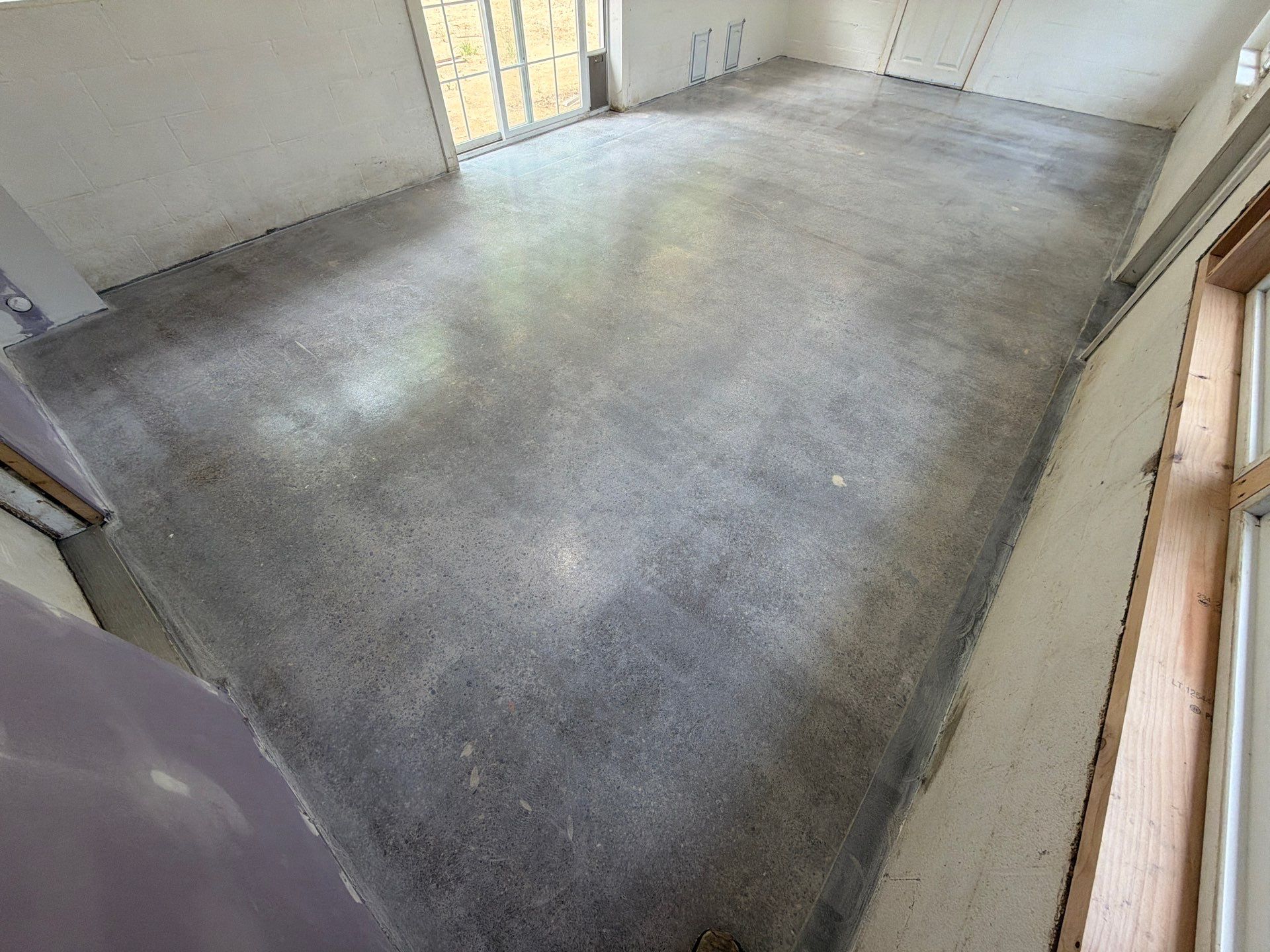 Grey Epoxy Flake Floor Installation for a Muskegon Sunroom by Gordon Painting