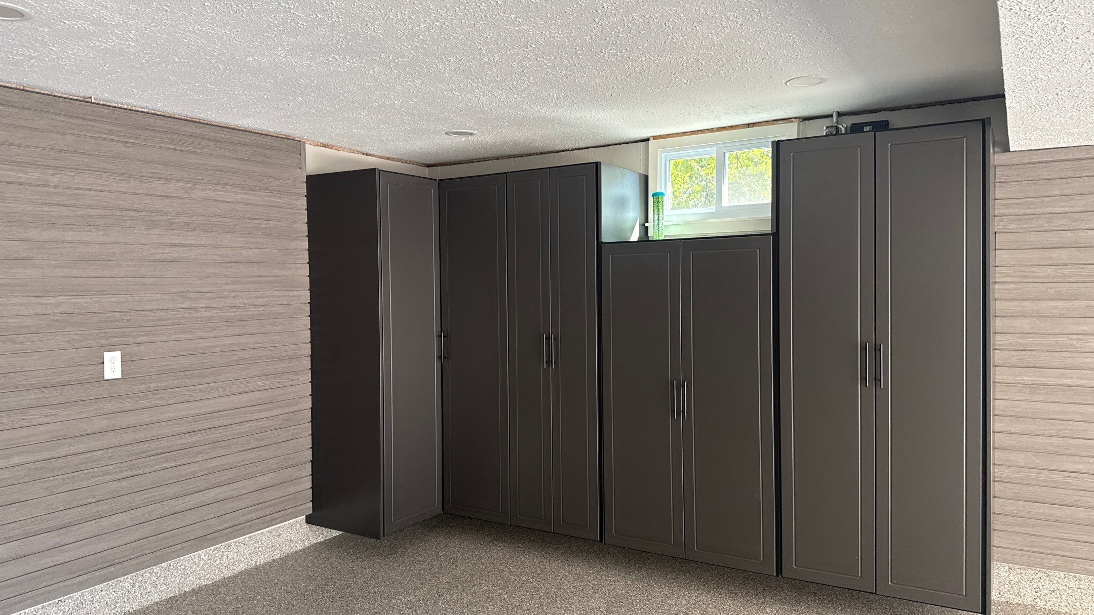 Wow Look Floor to Ceiling Slatwall  by Banner Garage