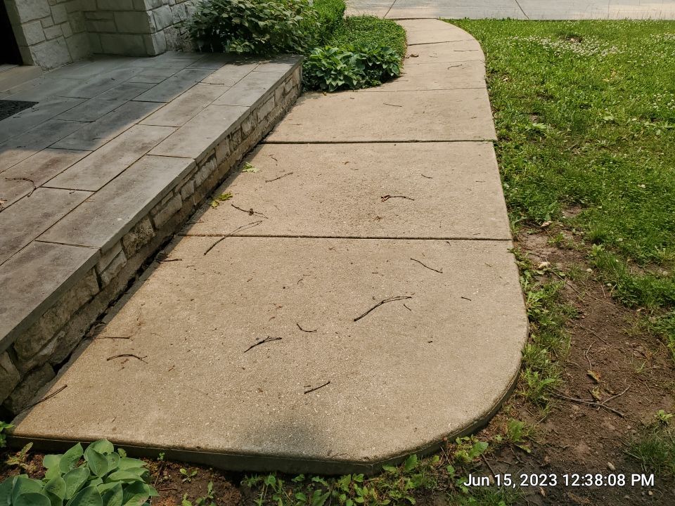 Highland Park, IL Bluestone, concrete,  Trex deck cleaning by Northern Power Washing LLC.
