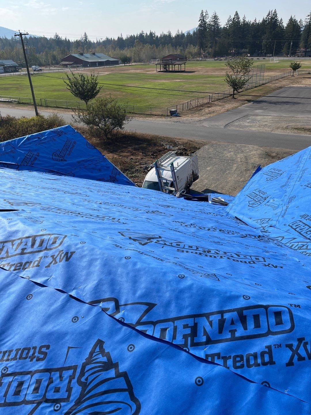 Residential Roofing Installation using OC Oakridge shingles by Top Notch Roofing Inc