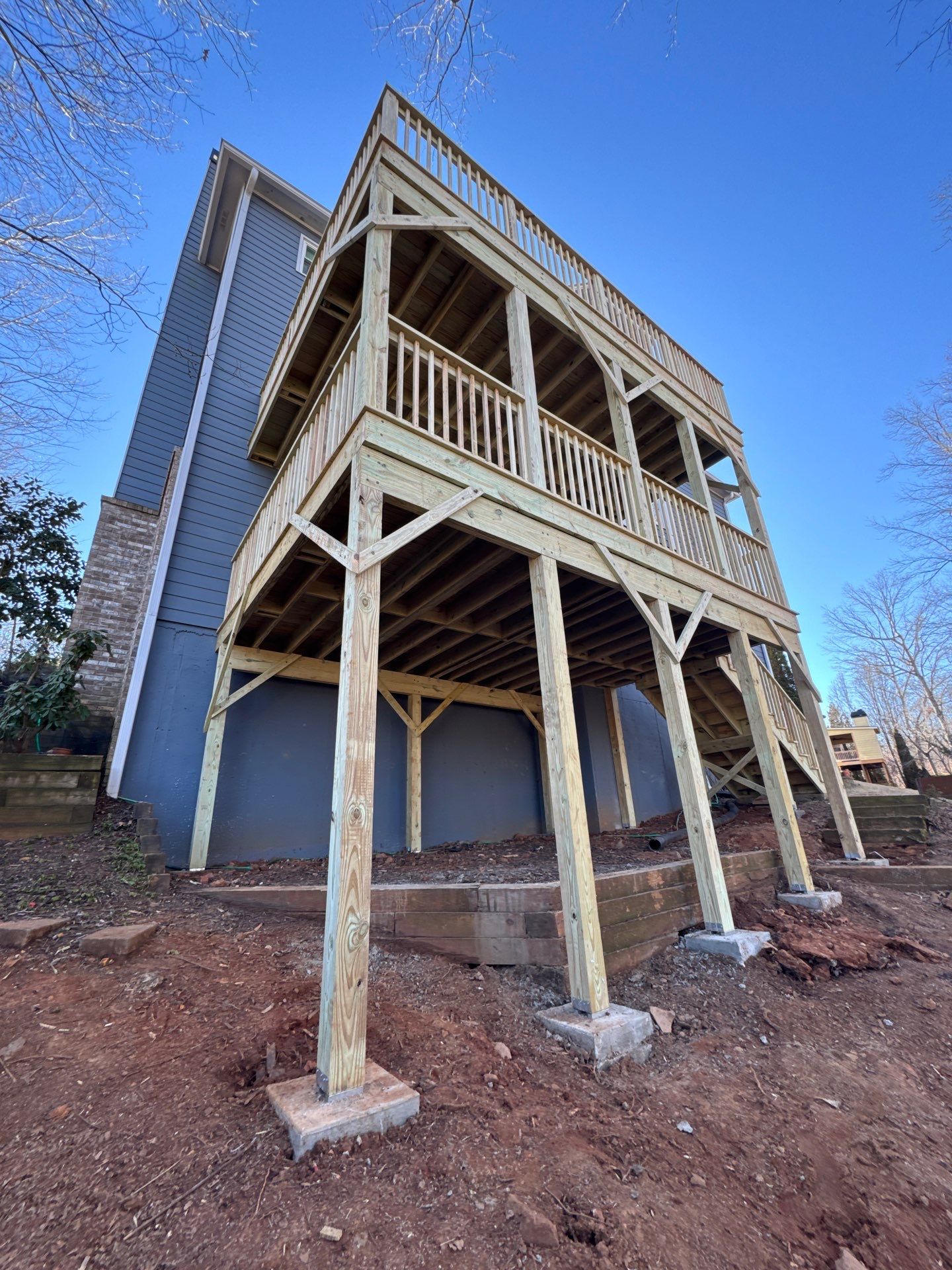 Two-Story Pressure-Treated Wood Deck Installation in Acworth, Georgia by Swift Home Renovations