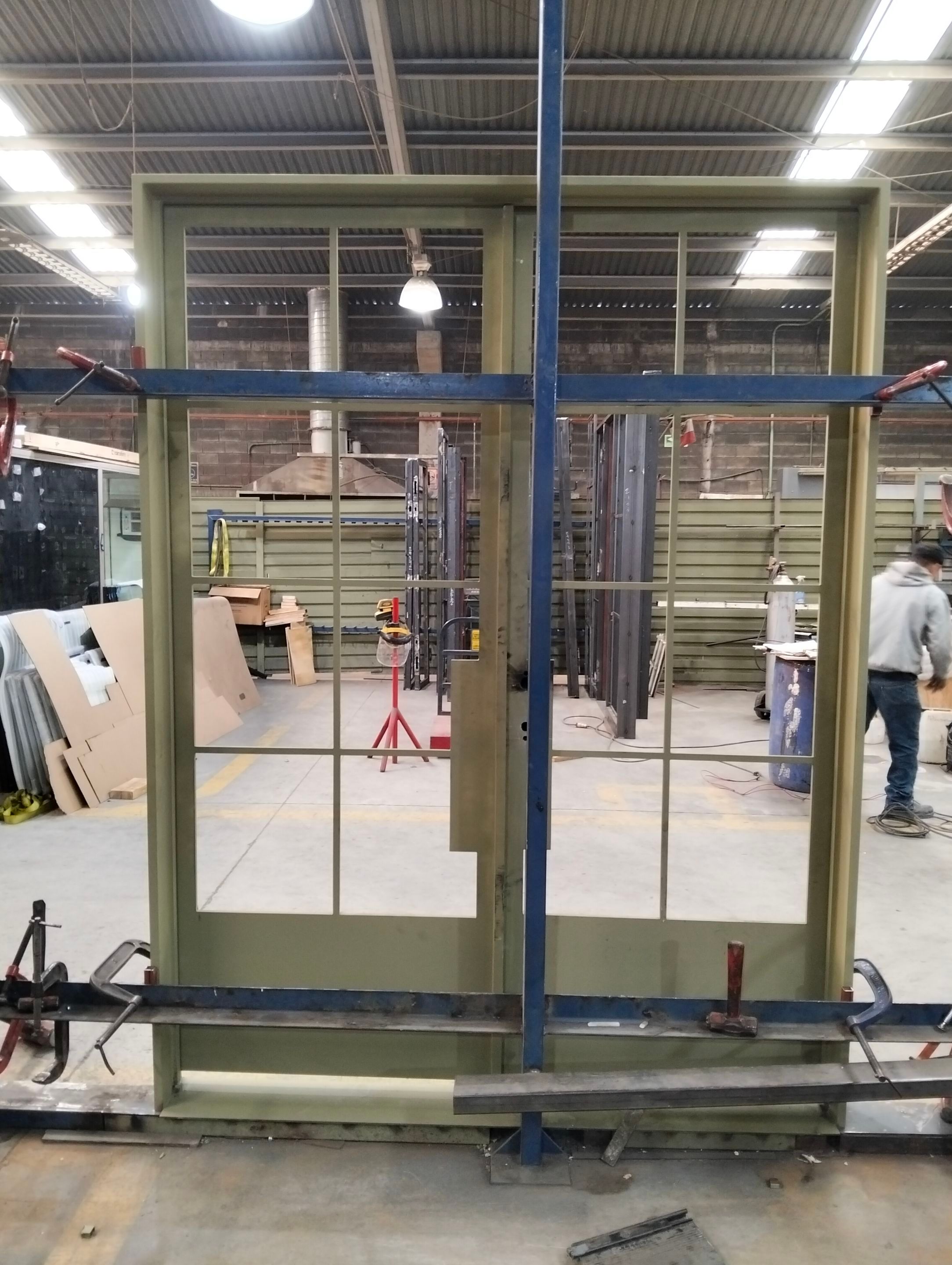 Steel Double Door Installation in Fort Worth in Sage Green by Solara Custom Living