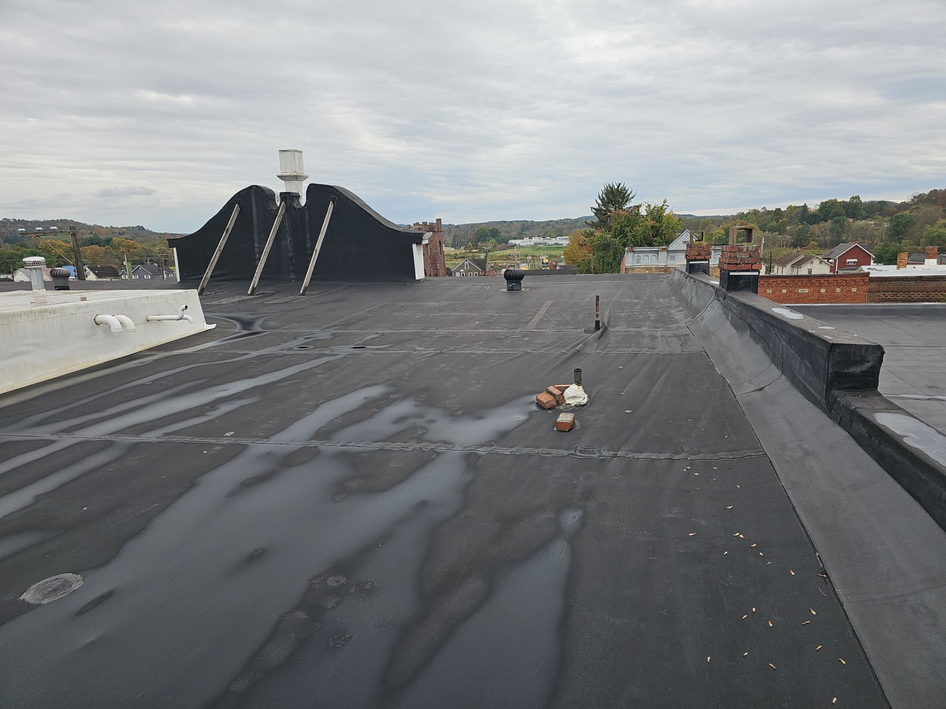 Western Auto  by 768 ROOF, LLC.