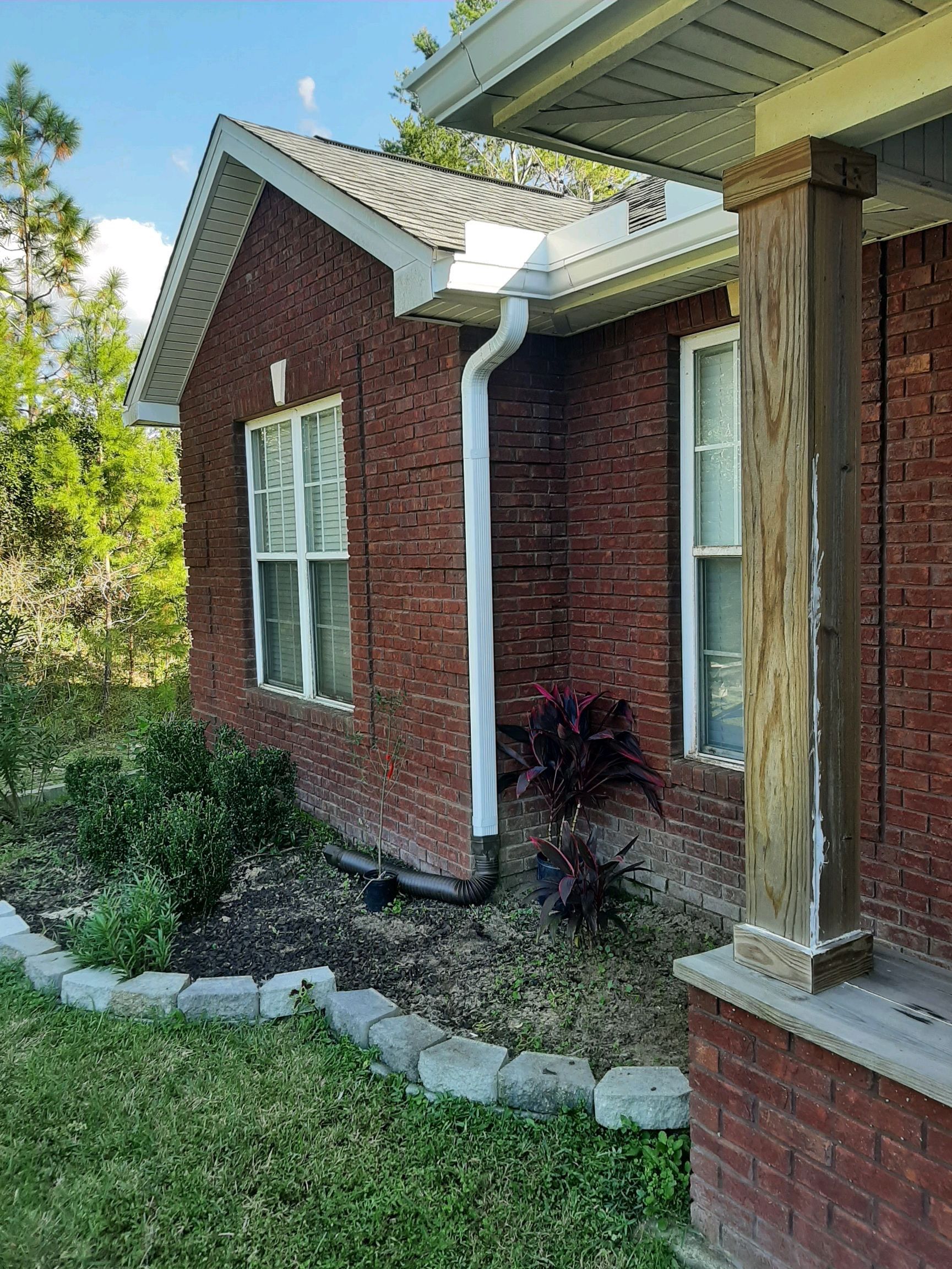 Gutter Installation using White K-Style Seamless Gutters by Gutter Professors