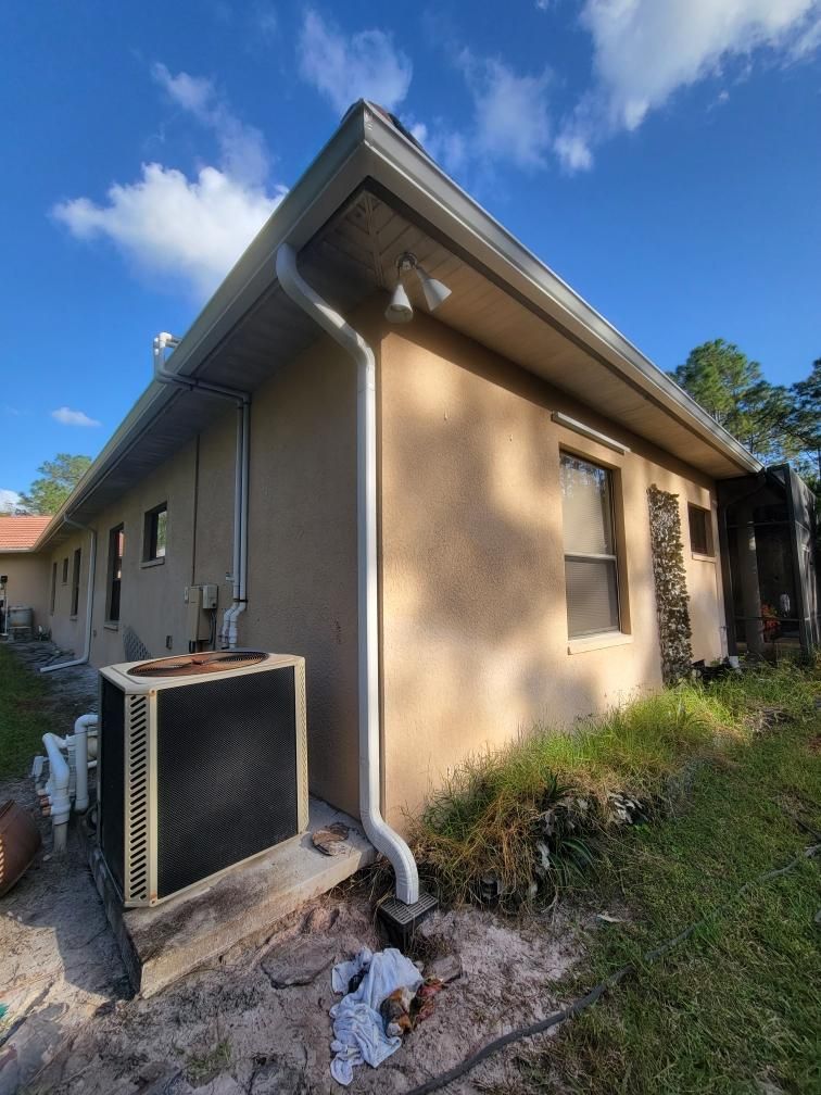 New Splash Guards and 6-Inch seamless Gutters in Naples FL by Gutter Professors