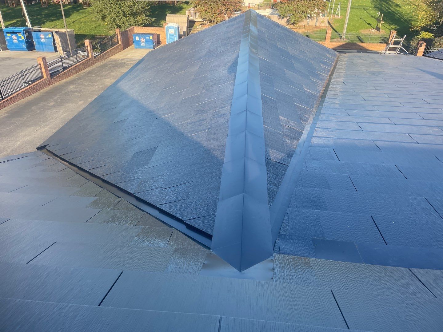 Tesla Solar Roof on a Commercial Building by American Home Contractors