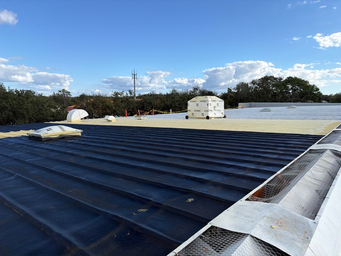 Sarasota Industrial Warehouse Metal Roof Silicone Coating Restoration by CES Roofing