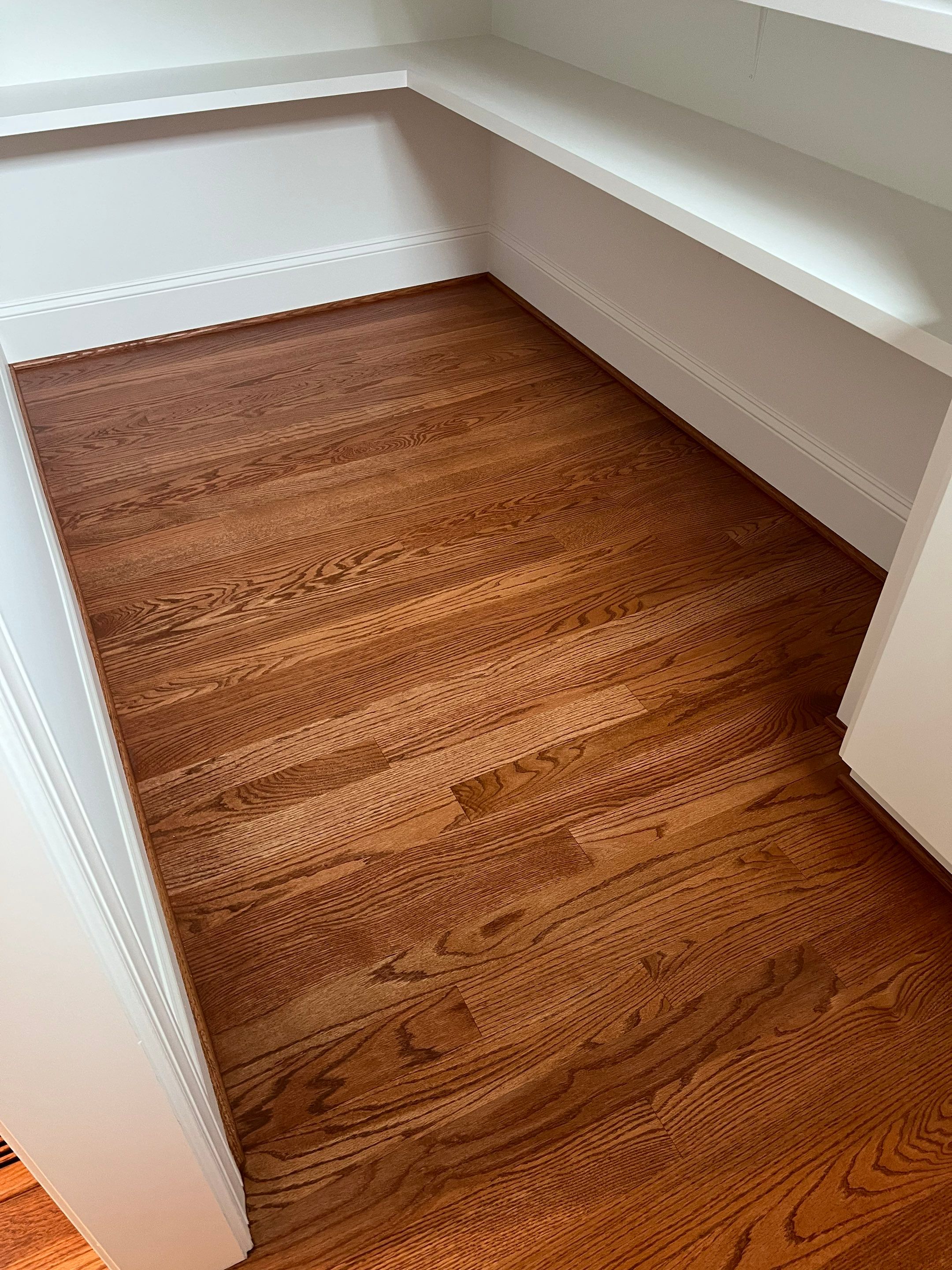 New construction home with a nice warm color by Accent Custom Floors