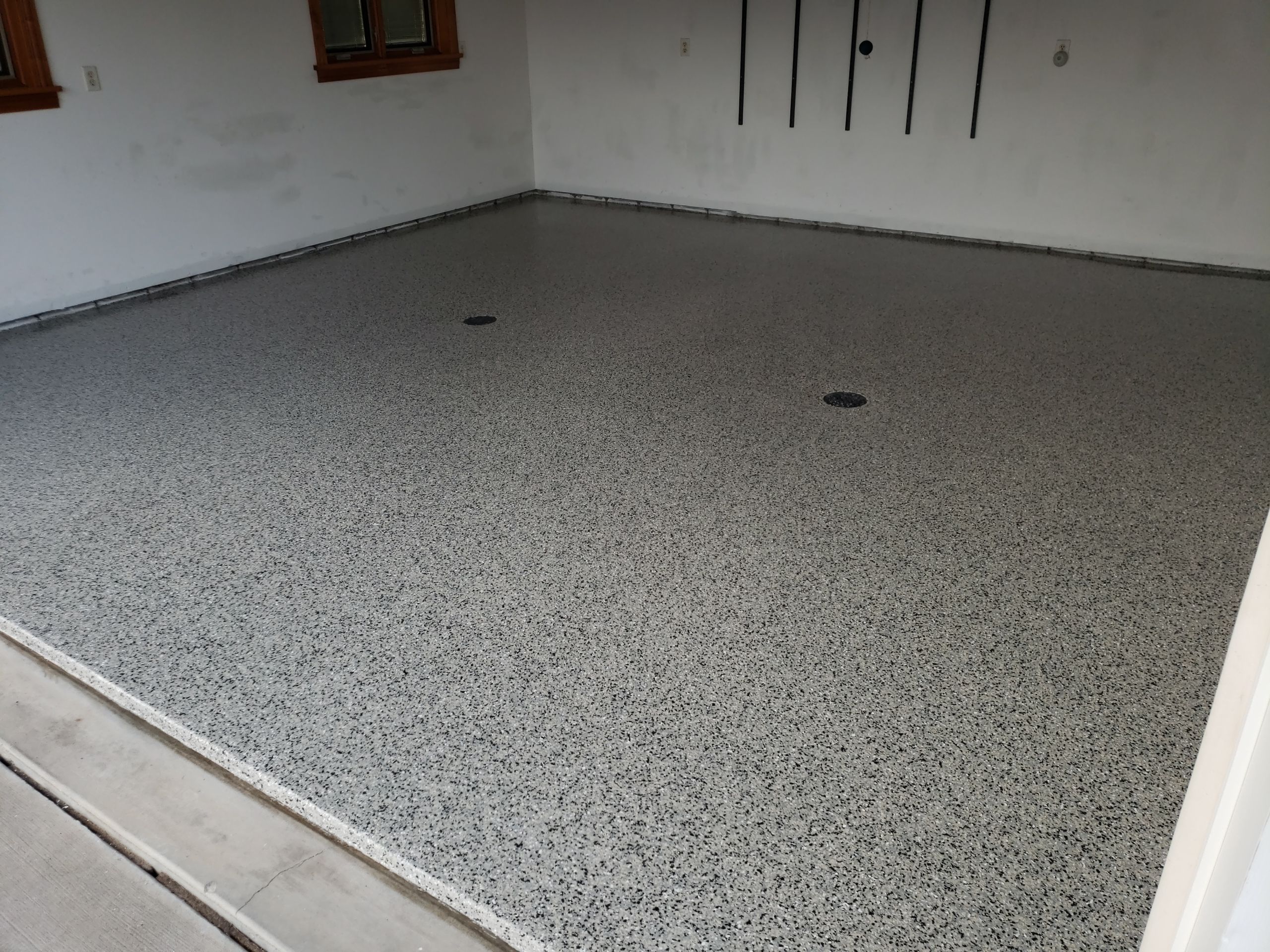 St. Joseph -- Front Patio and Garage Epoxy Garage Coating System by Big Red Decorative Concrete, LLC