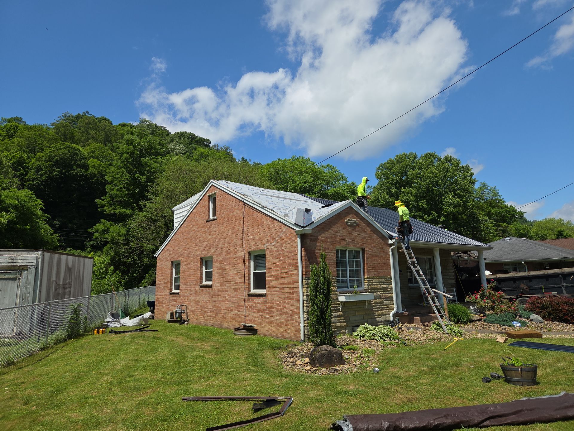 Residential Roofing Installation using Metal by Mr. Roofer