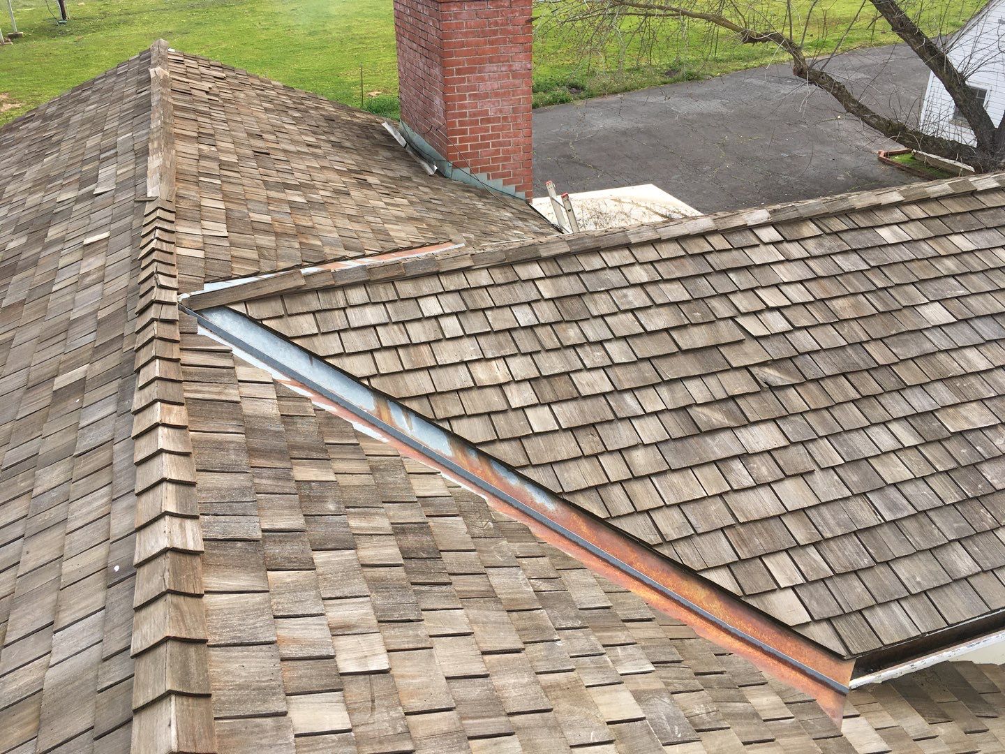 Residential Roofing Installation using Standing seam metal roofing system by Straight Edge Roofing Inc