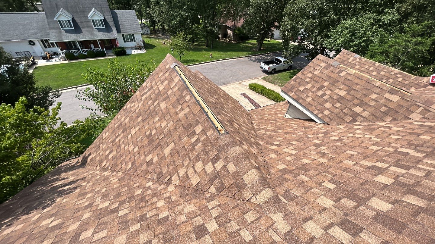 Residential Roof + Gutters & Downspouts & Gutter Guards  by Titan Commercial & Residential Roofing 