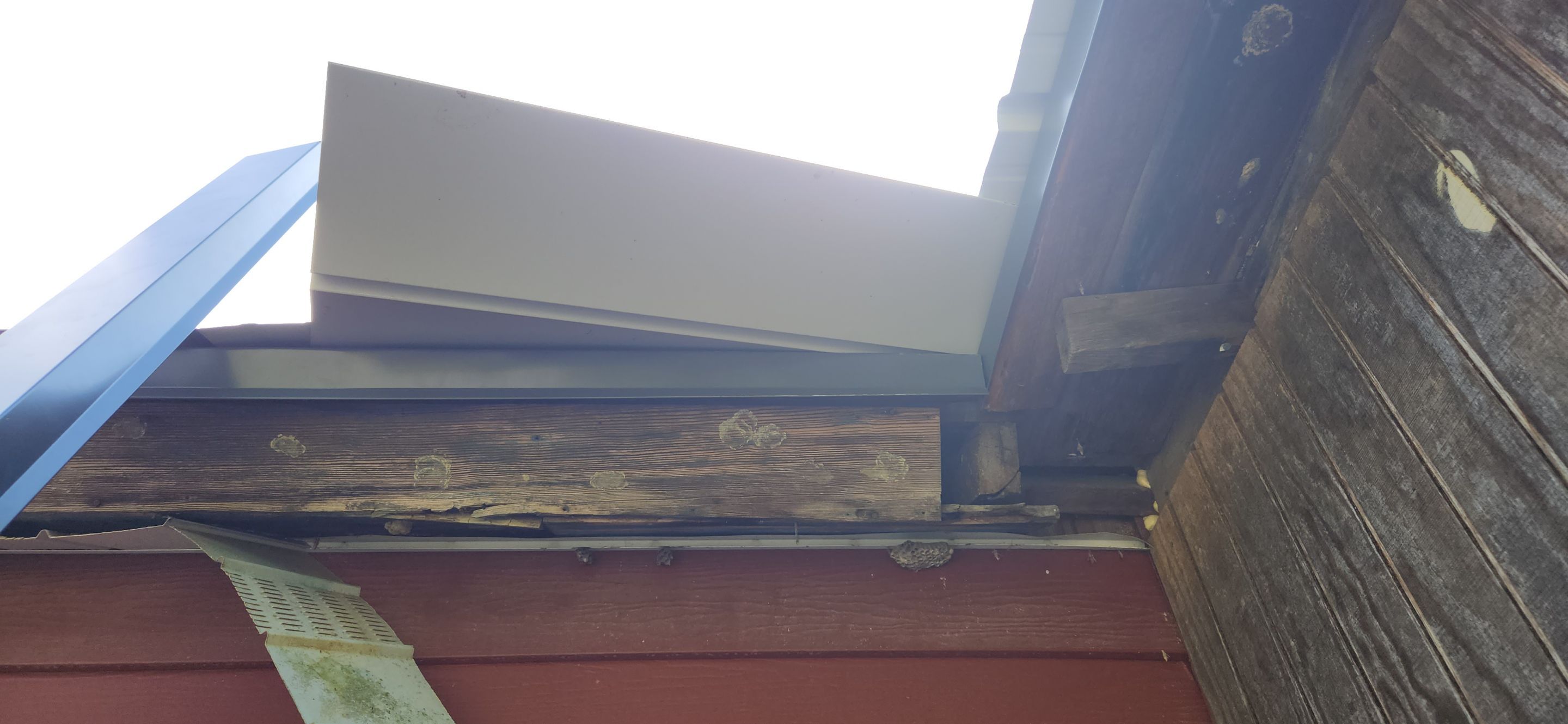 Residential Roofing Installation using 26 Gauge Colored Panels by Hostetler Roofing